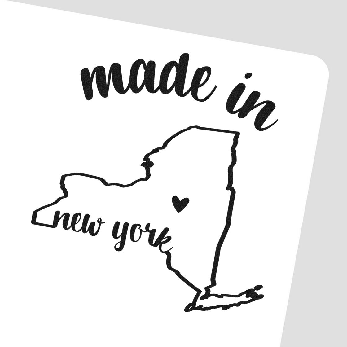 Self-Inking Handmade with Love in New York Stamp featuring a map outline of New York with a heart, and the words 'made in new york' in stylish black font.