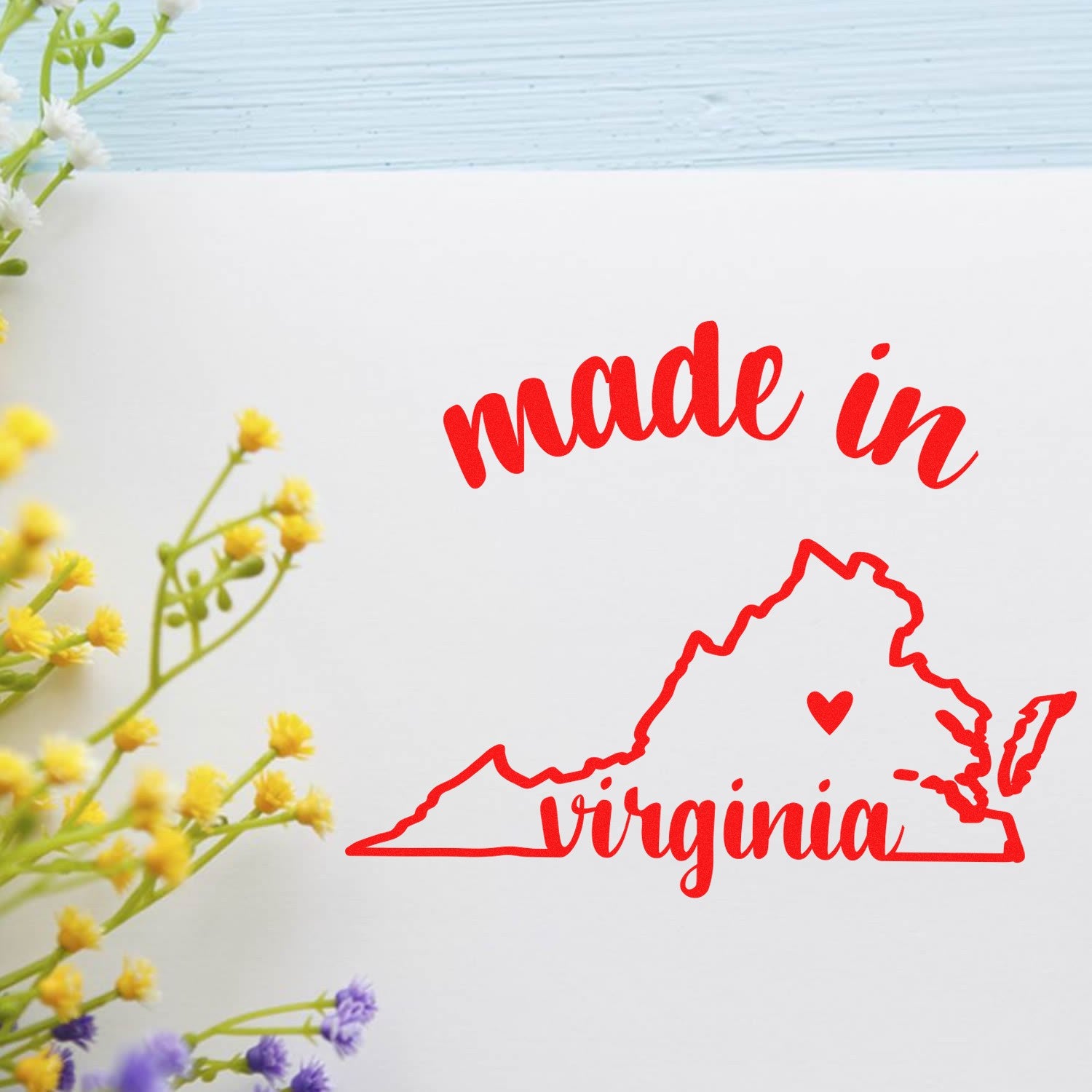 Self-Inking Handmade with Love in Virginia Stamp featuring a red outline of Virginia with made in Virginia text, surrounded by colorful flowers. Perfect for crafts and gifts.