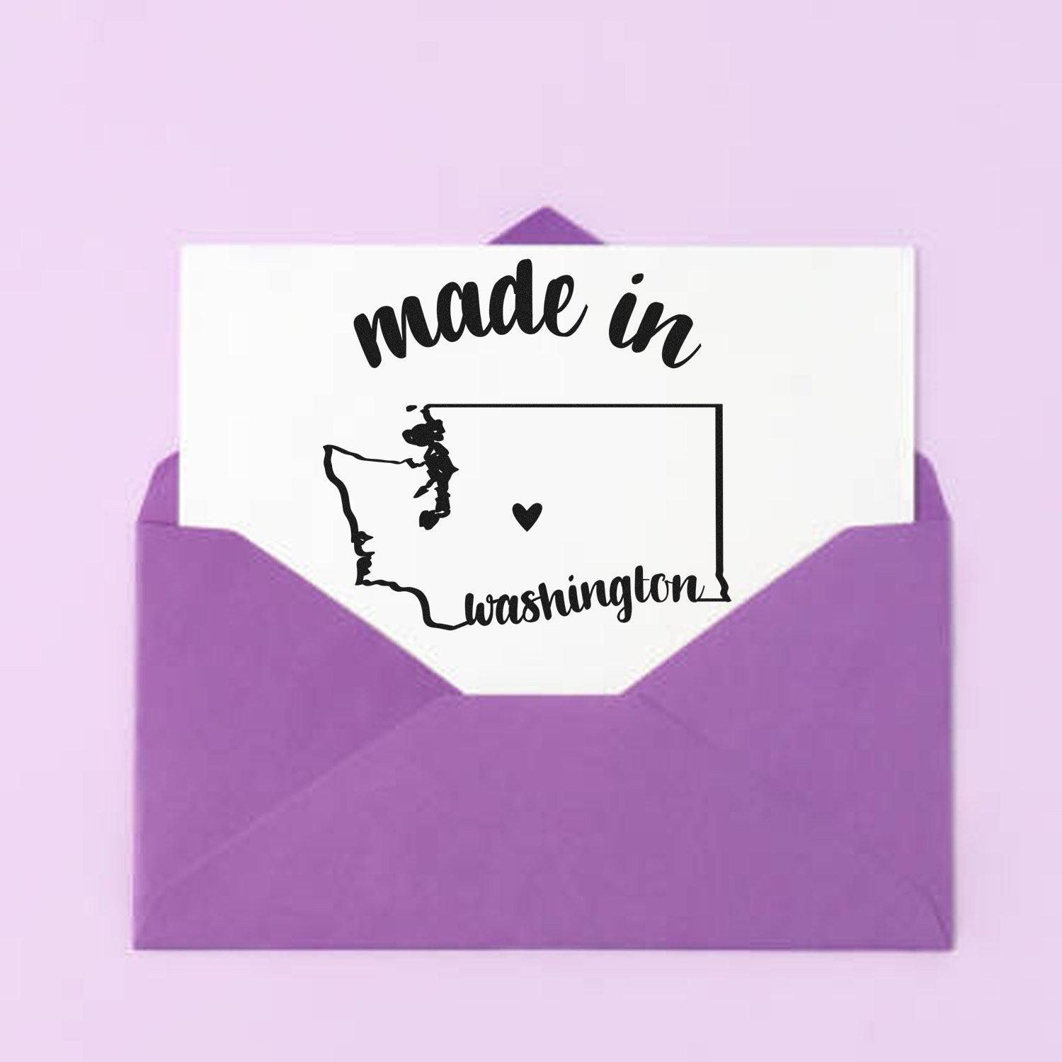 Self-Inking Handmade with Love in Washington Stamp on a white card inside a purple envelope, featuring a heart and Washington state outline design.