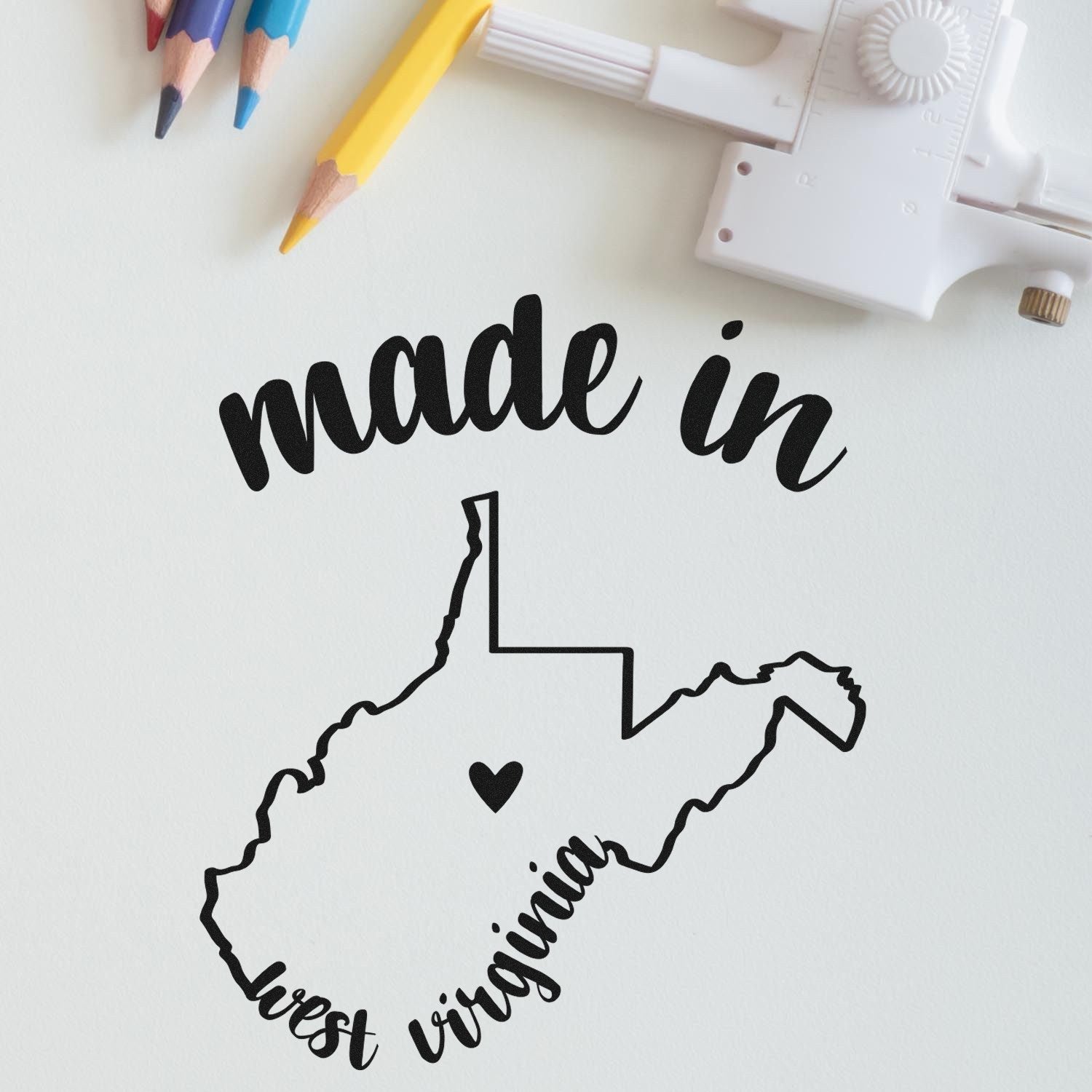 Self-Inking Handmade with Love in West Virginia Stamp featuring a heart and state outline, perfect for crafts and gifts.