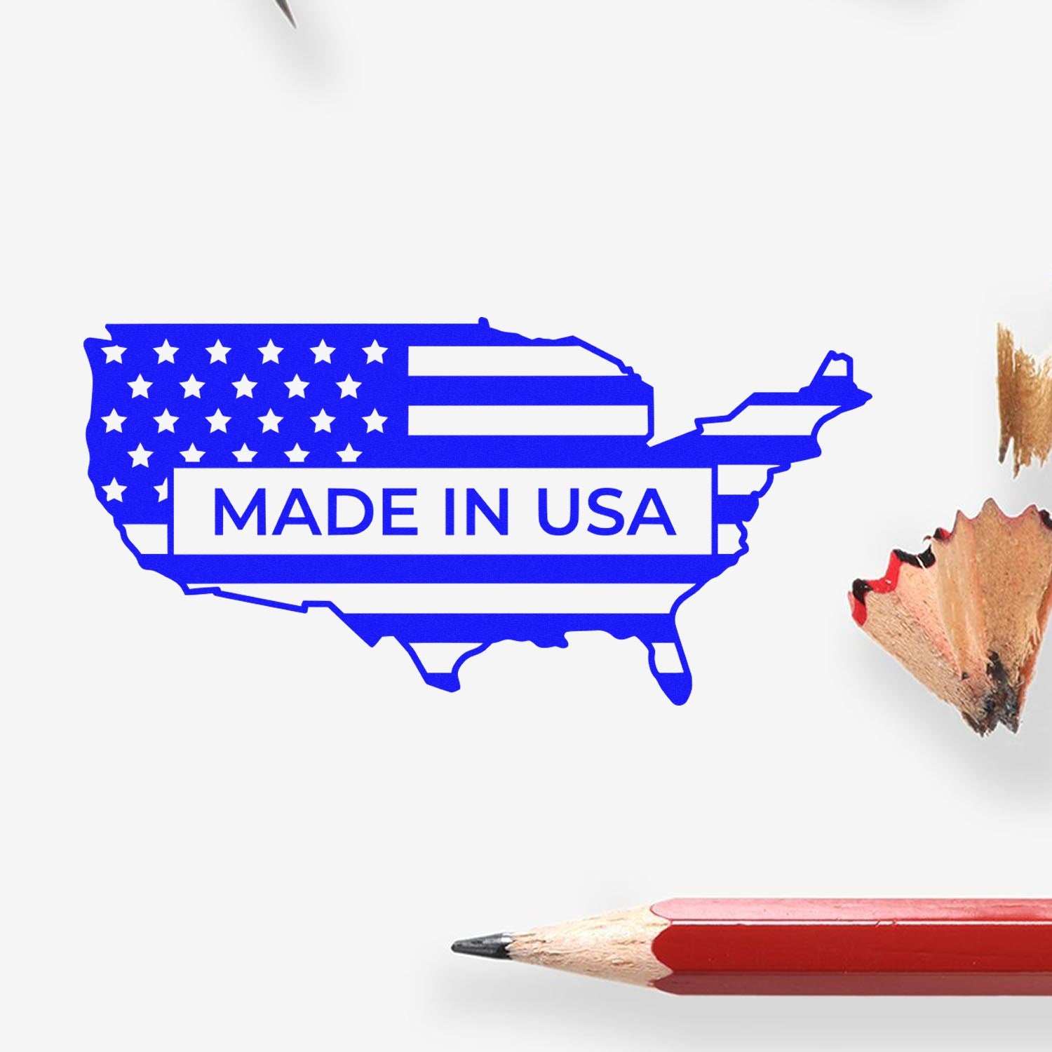 Slim Pre-Inked Patriotic USA Seal Stamp featuring a blue map of the USA with stars and stripes, and 'Made in USA' text, surrounded by pencil shavings and a red pencil.