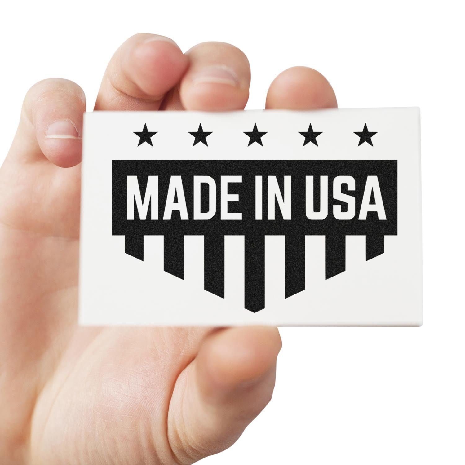 Slim Pre-Inked Patriotic Quality Seal Stamp featuring Made in USA text with stars and stripes design, held in hand. Perfect for adding a patriotic touch to documents and products.