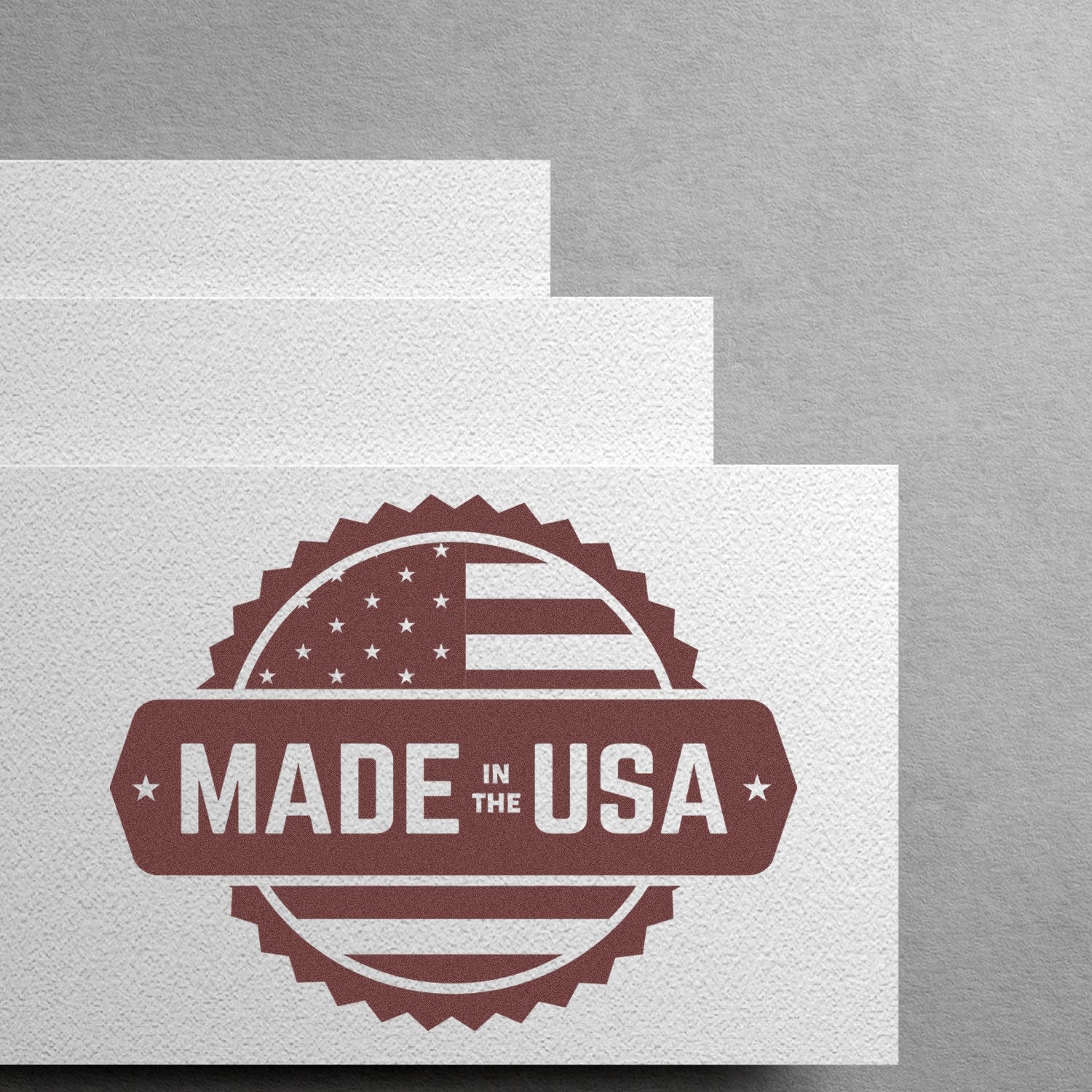 Wood Handle American Craftsmanship Seal Rubber Stamp on textured paper, featuring a Made in the USA design with a flag motif, showcasing quality and authenticity.