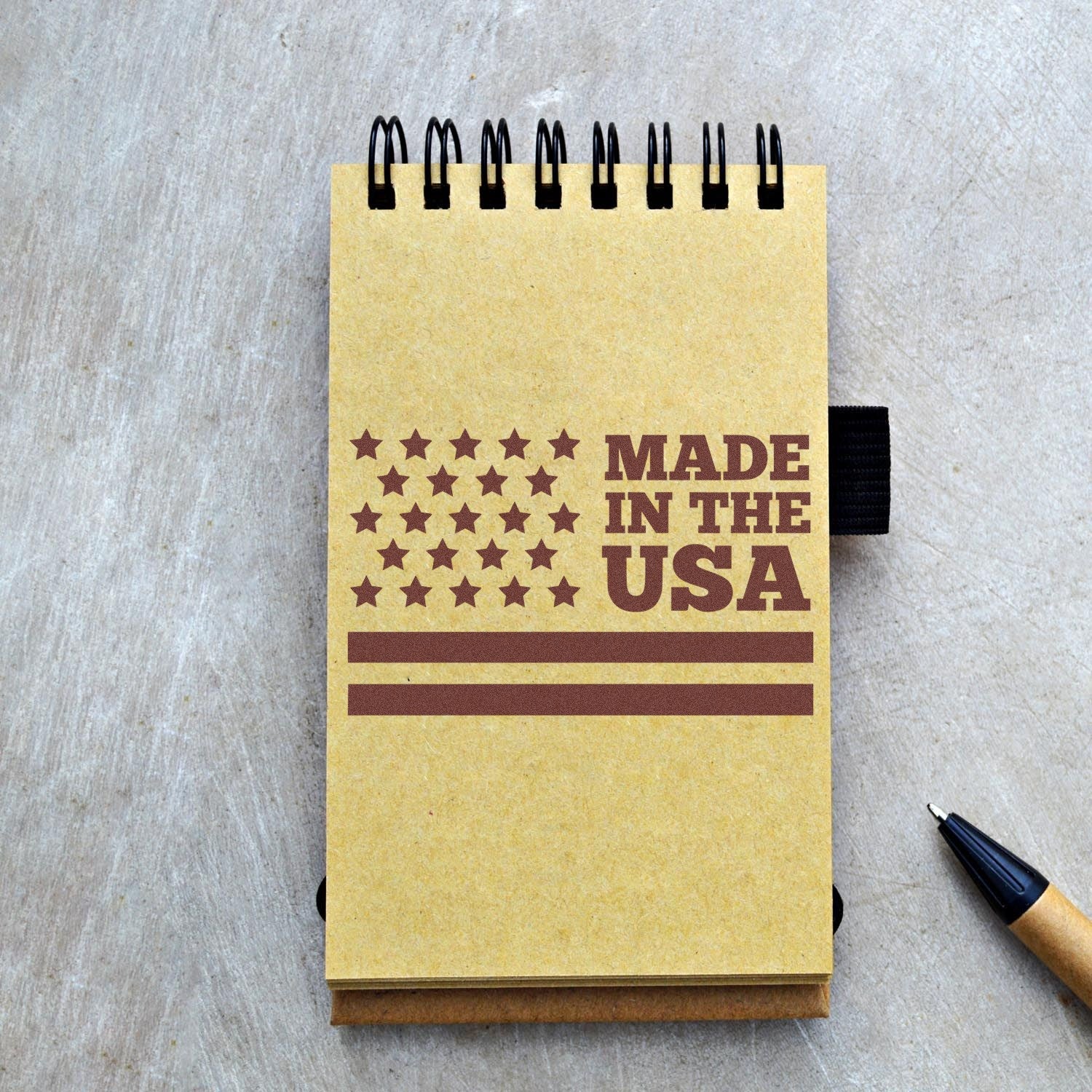 Self-Inking Patriot Pride Stamp Stamp on a notebook with 'Made in the USA' design, showcasing its crisp, patriotic imprint. Ideal for adding a touch of American pride to your stationery.