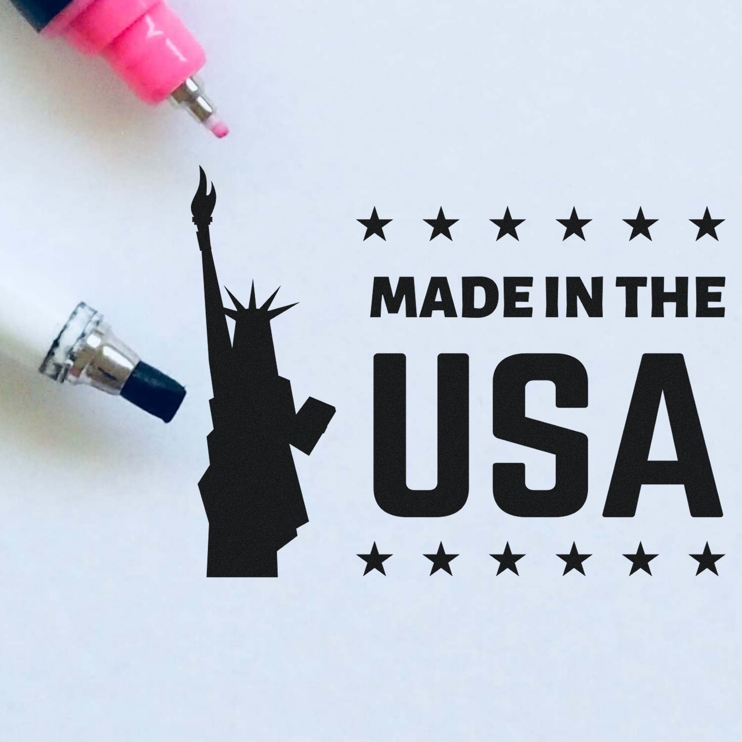 Self-Inking Liberty Made In The USA Stamp with Statue of Liberty silhouette and 'Made in the USA' text, featuring stars. Ideal for patriotic stamping needs.