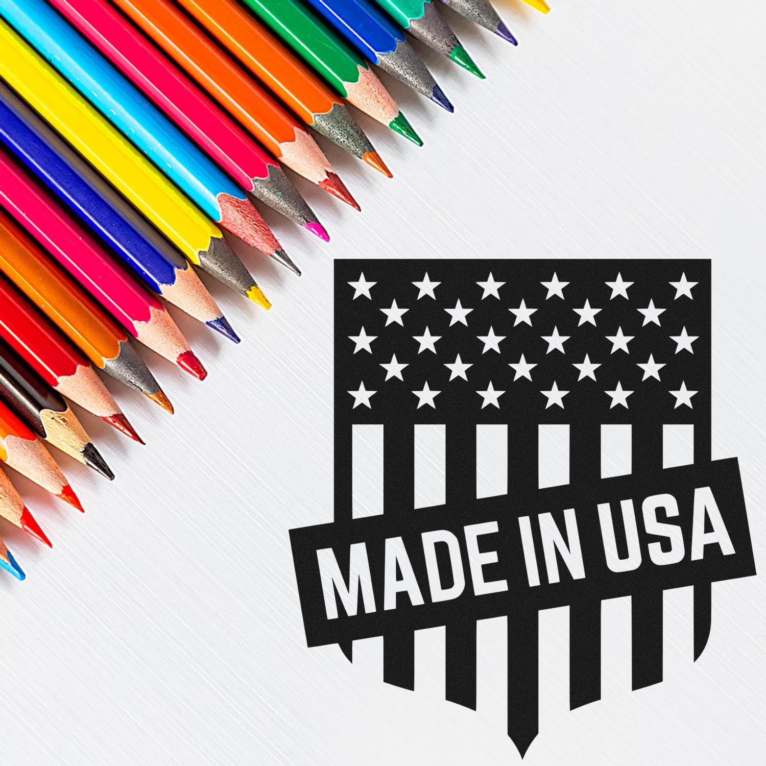 Wood Handle Patriotic Seal Of Quality Rubber Stamp with 'Made in USA' design, featuring stars and stripes, next to colorful pencils on a white background.