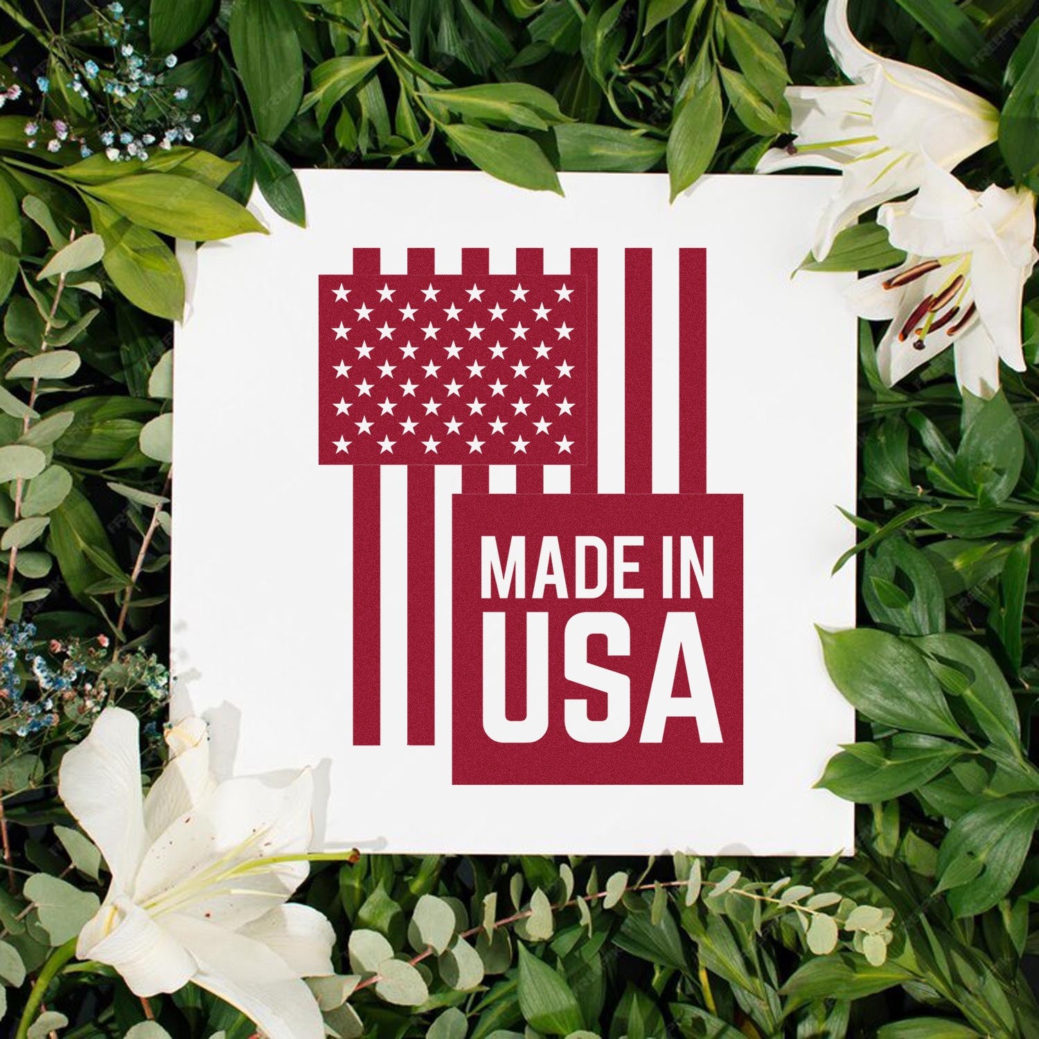 Slim Pre-Inked USA Patriotic Pride Stamp featuring a red American flag design with Made in USA text, set against a lush green foliage background. Perfect for showcasing national pride.