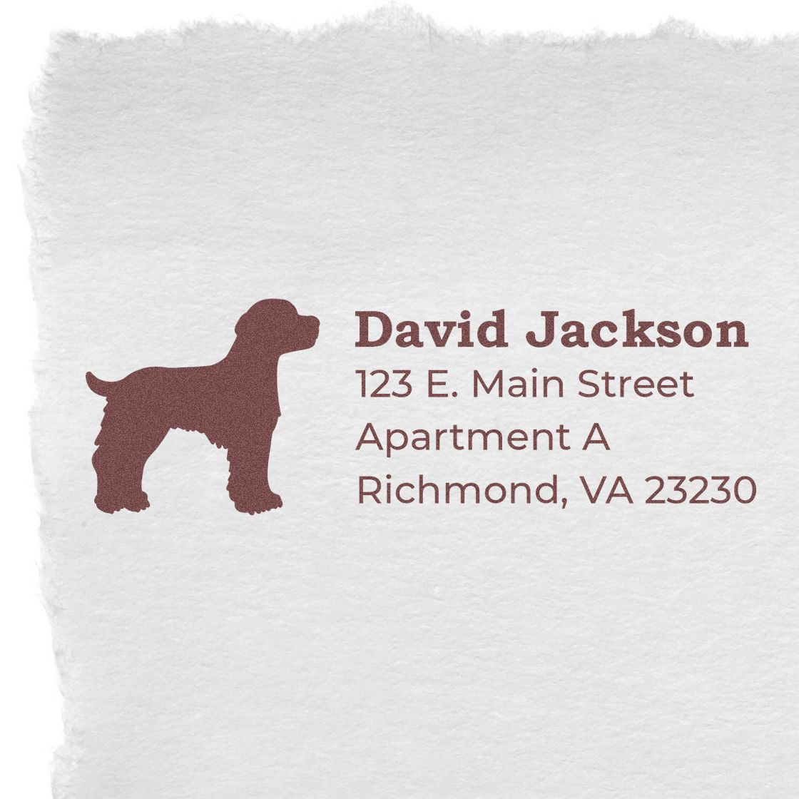 Slim Pre-Inked Brittany Spaniel Address Stamp featuring a silhouette of a dog next to the address text on textured paper. Perfect for personalizing mail with a touch of elegance and charm.