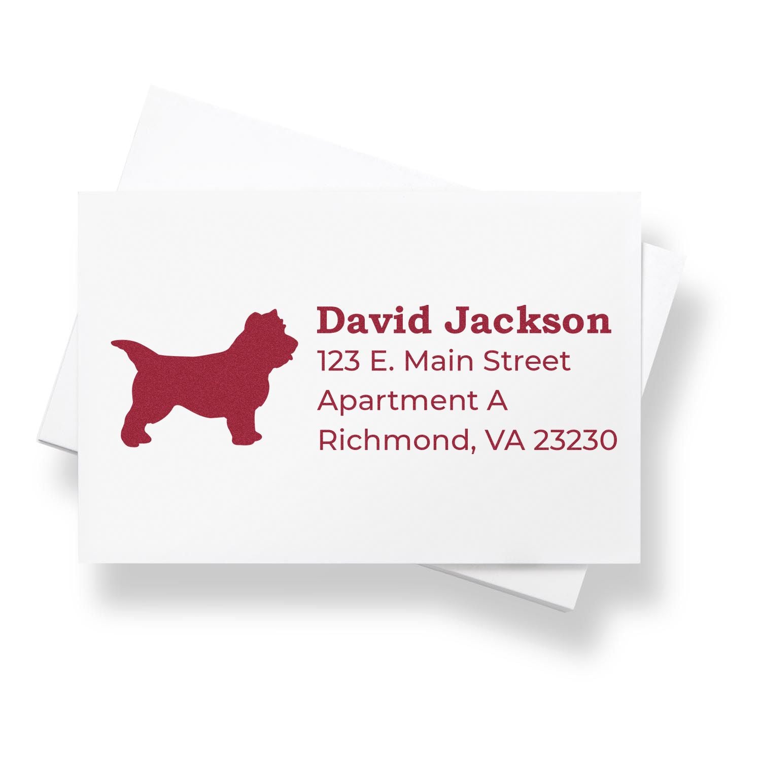 Self-Inking Cairn Terrier Dog Address Stamp on white envelope, featuring a red silhouette of a Cairn Terrier and sample address text in bold red font.