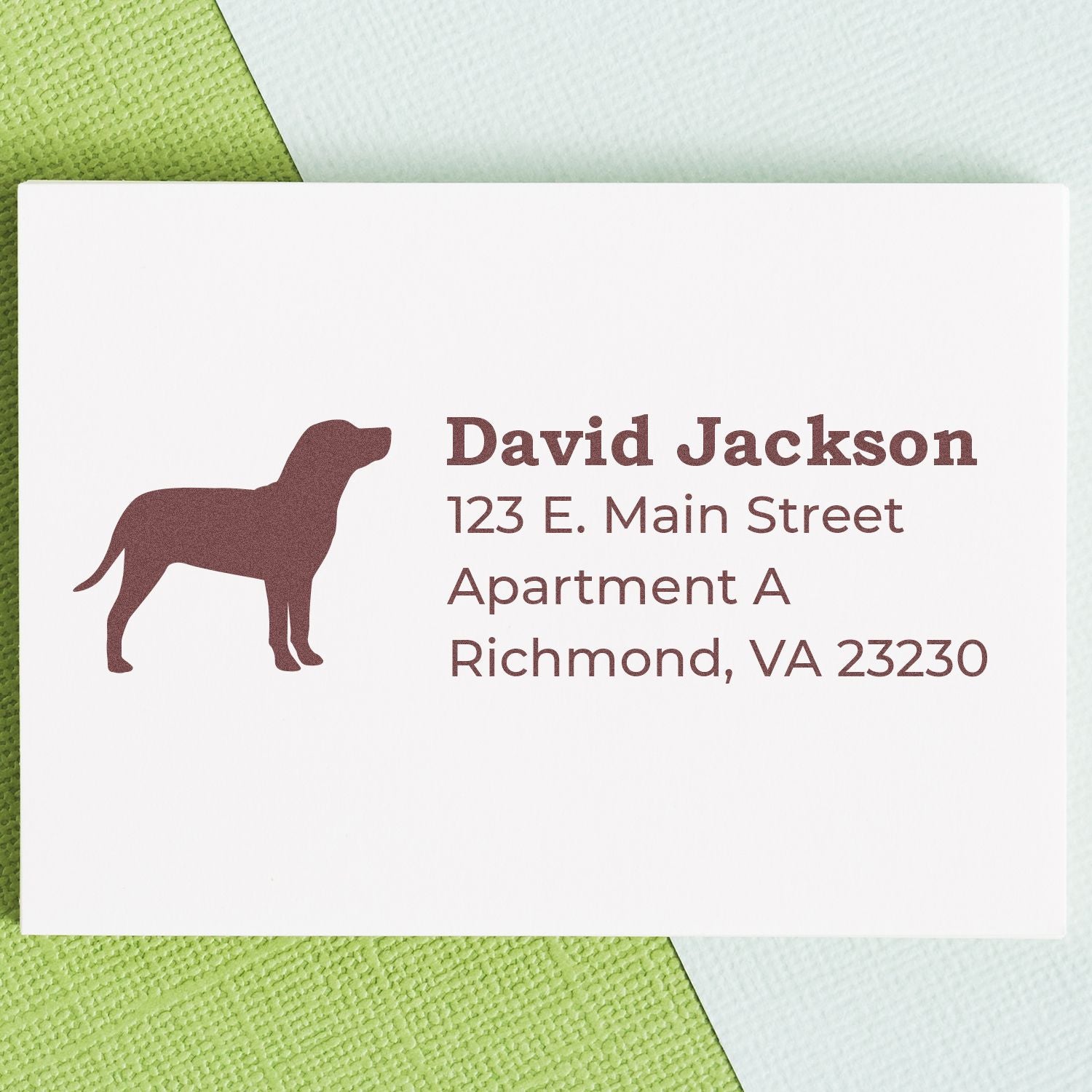 Catahoula Silhouette Address Rubber Stamp on a card with a dog silhouette and sample address text, placed on a green textured background.