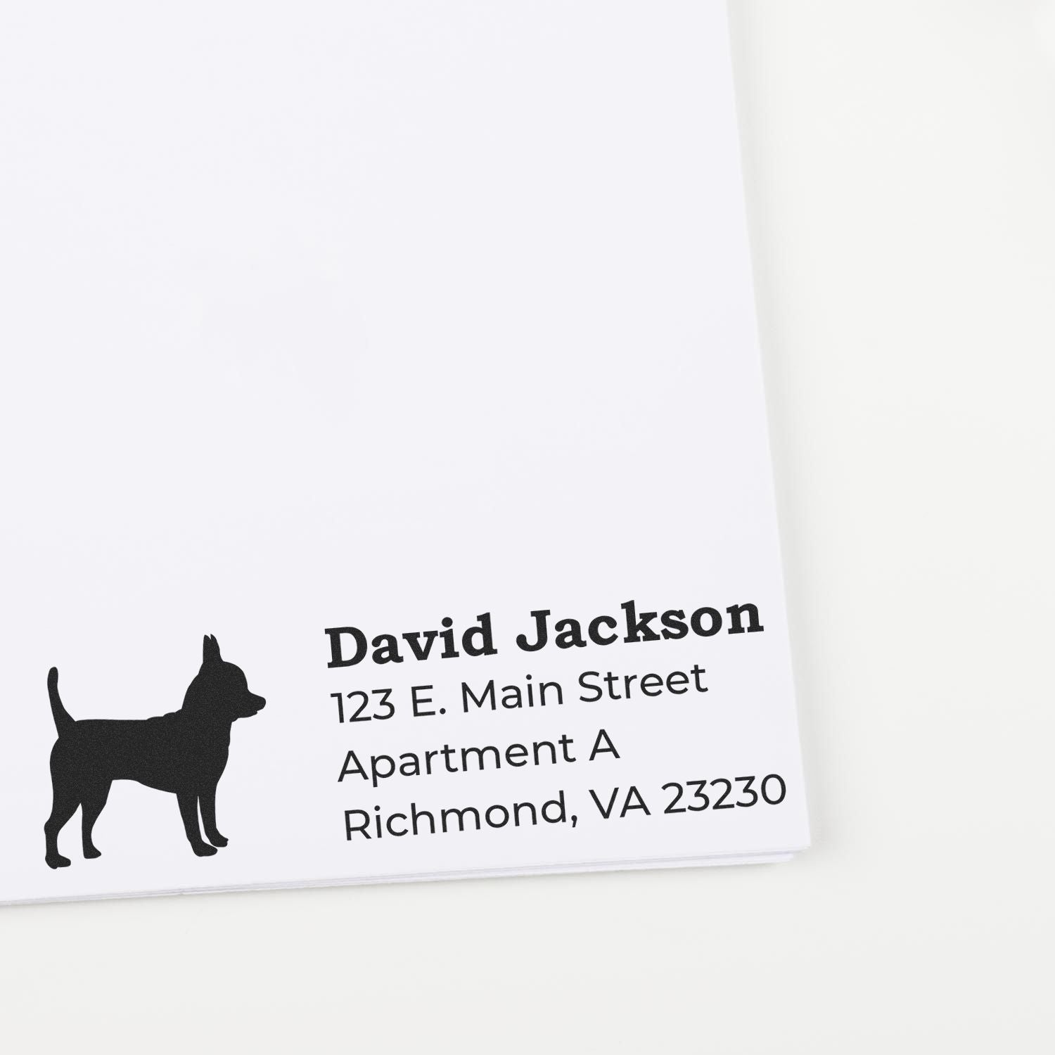 PSI Pre-Inked Personalized Chihuahua Address Stamp on white paper, featuring a silhouette of a Chihuahua and sample address text in bold black font.