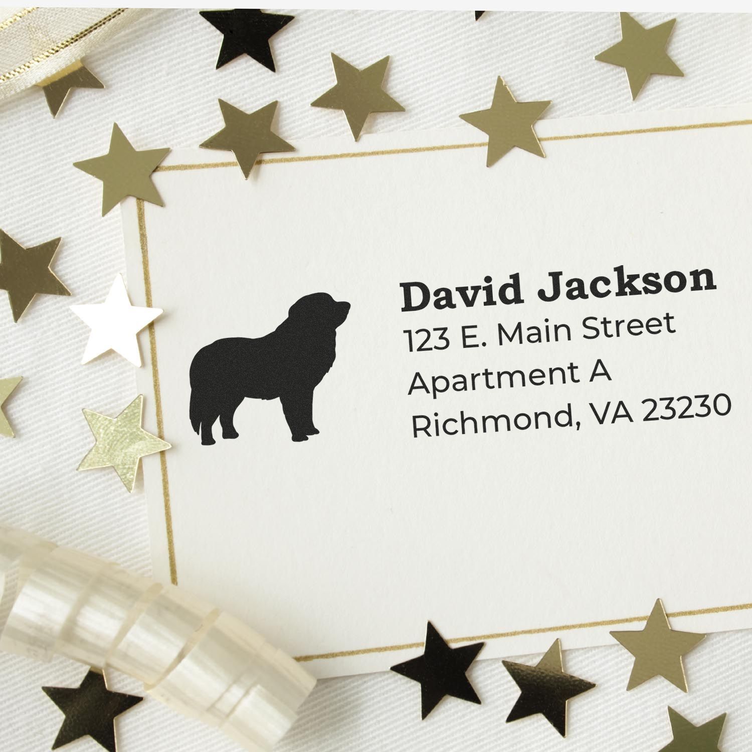 Self-Inking Pyrenees Dog Address Stamp on a card with gold stars and ribbon. Displays name, address, and silhouette of a Pyrenees dog. Perfect for personalized stationery.