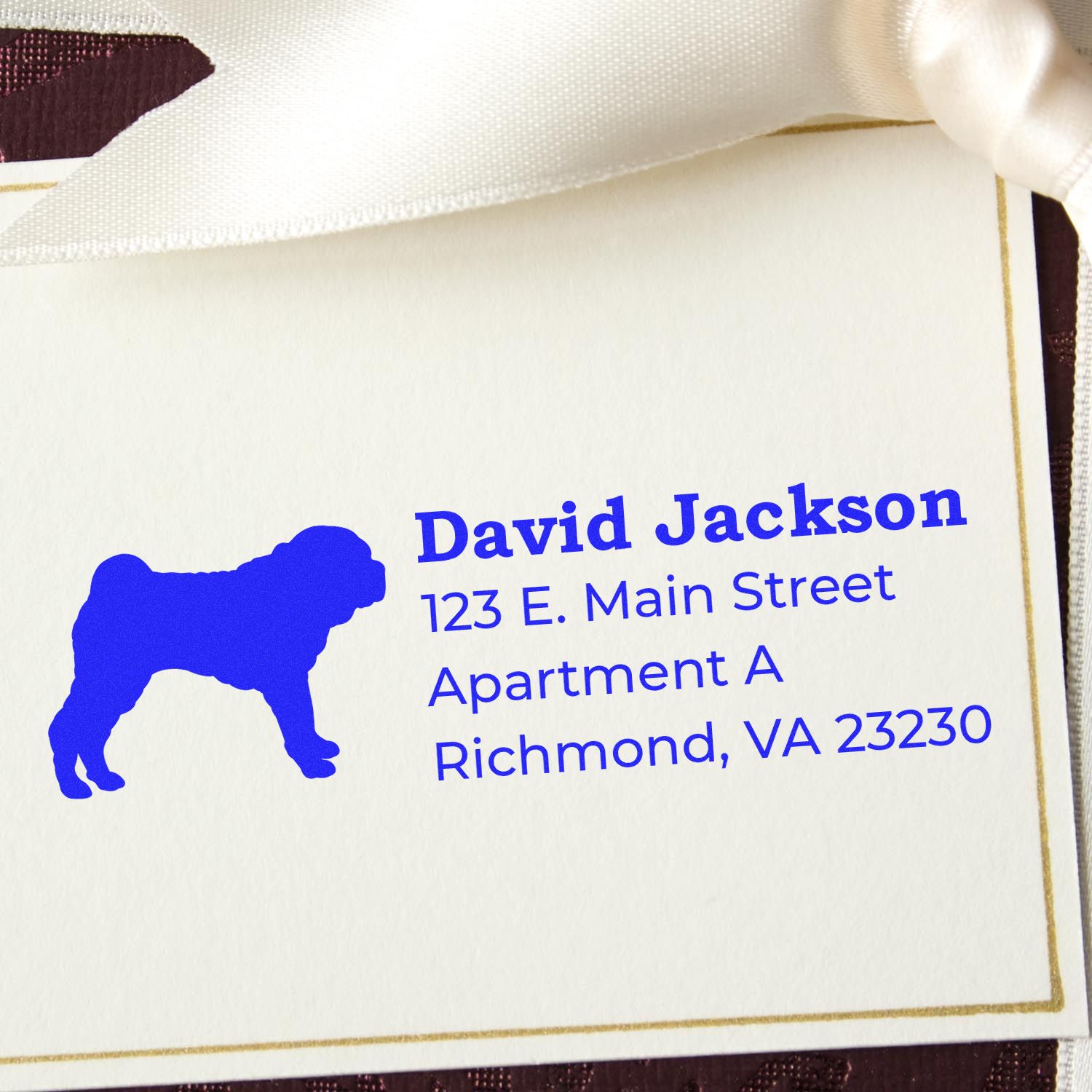 Slim Pre-Inked Shar Pei Address Stamp on a cream card with a blue Shar Pei silhouette and sample address text, adorned with a white ribbon.