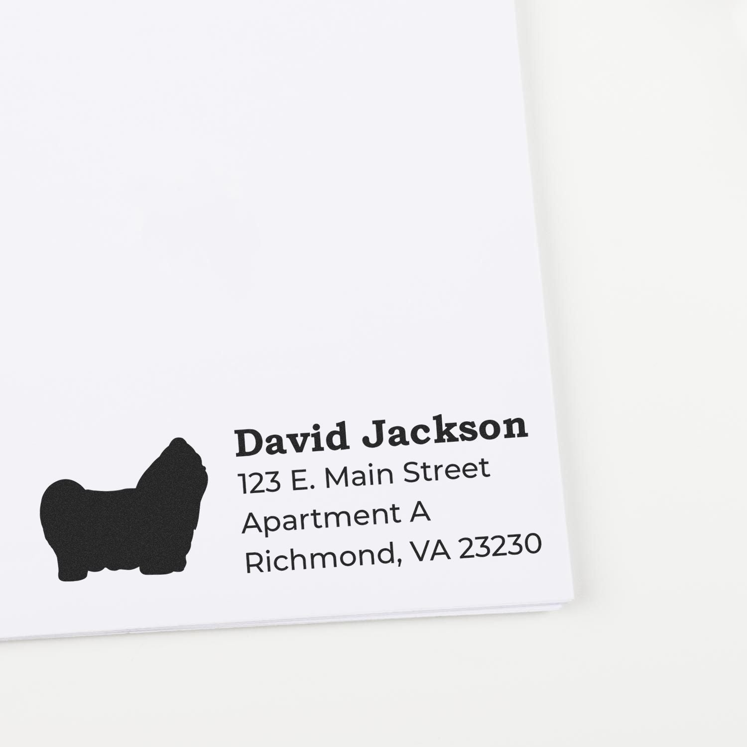 Self-Inking Shih Tzu Dog Address Stamp on white paper, featuring a silhouette of a Shih Tzu and sample address text in bold black font.