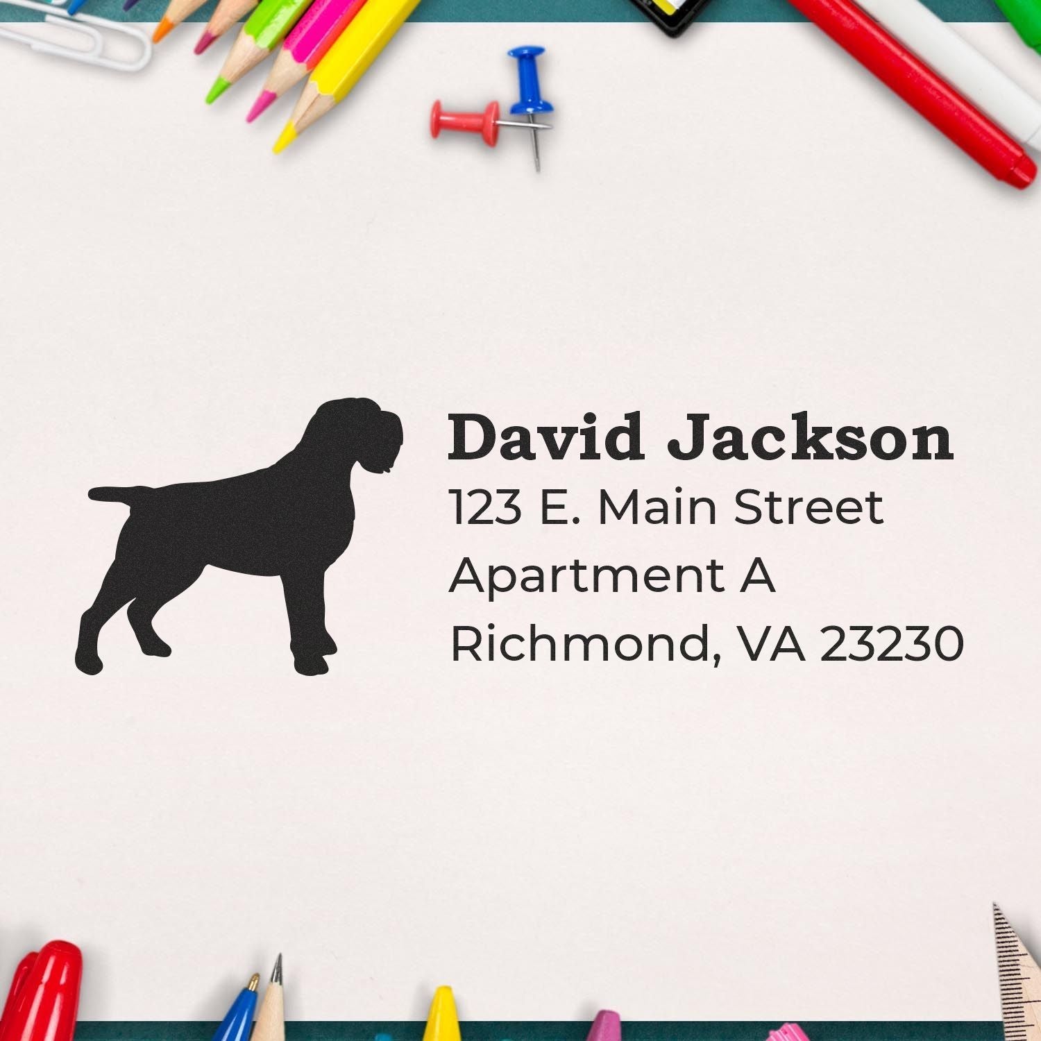 Slim Pre-Inked Wirehaired Pointing Griffon Address Stamp on paper with colorful stationery, featuring a silhouette of the dog and sample address text.