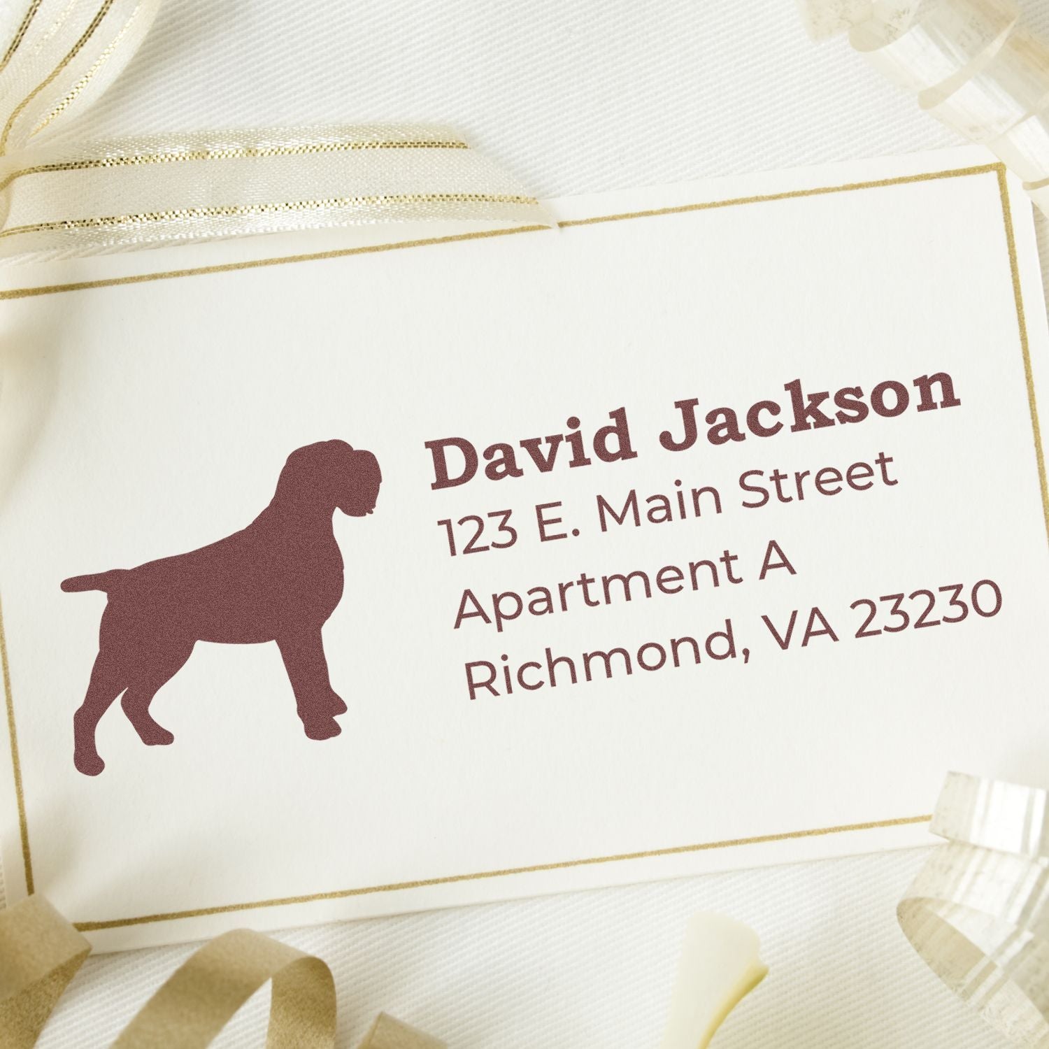 PSI Pre-Inked Personalized Wirehaired Pointing Griffon Address Stamp on a card with a dog silhouette, surrounded by gold ribbon.