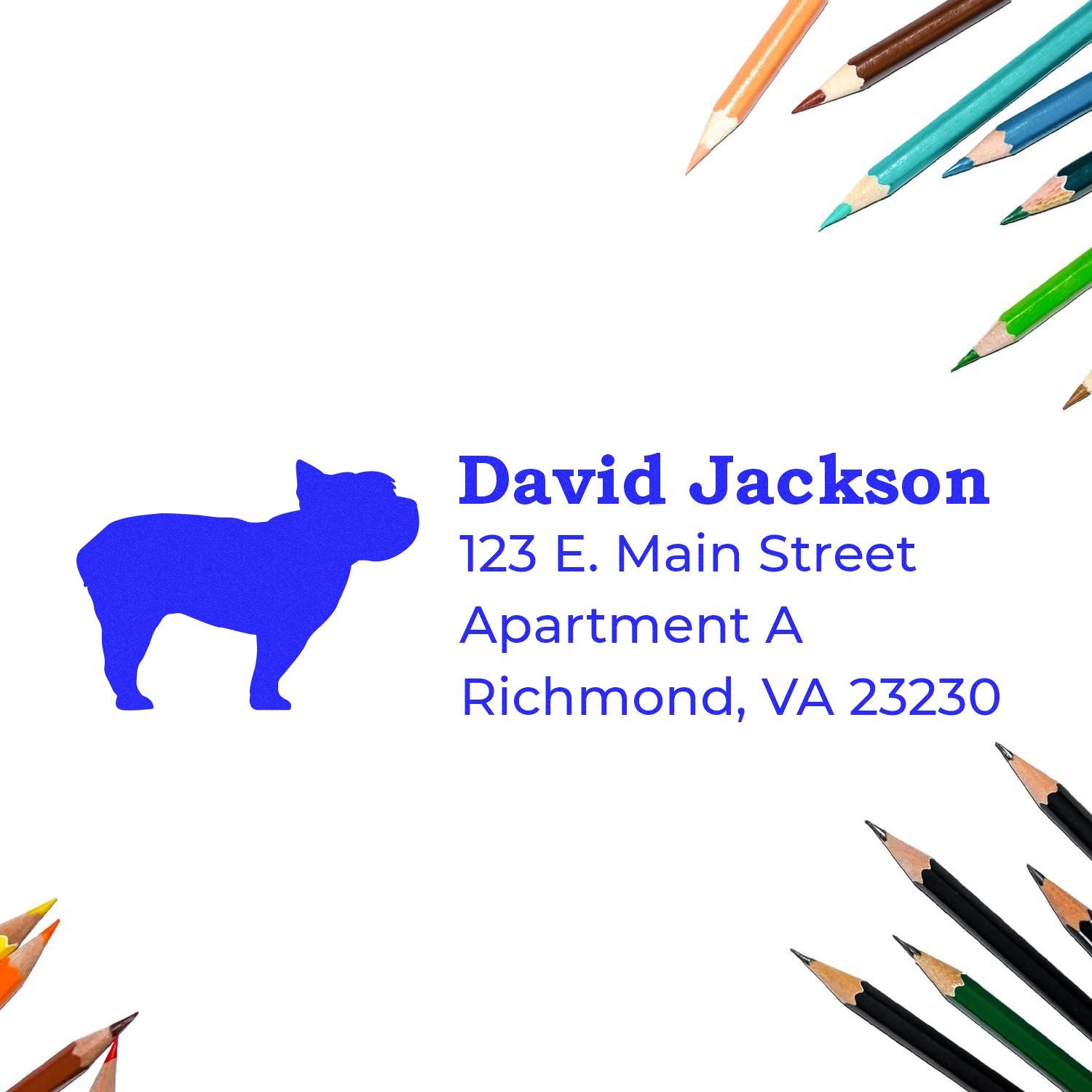 PSI Pre-Inked Personalized Yorkshire Terrier Address Stamp on white paper, surrounded by colorful pencils, featuring a blue silhouette of a Yorkshire Terrier and sample address text.