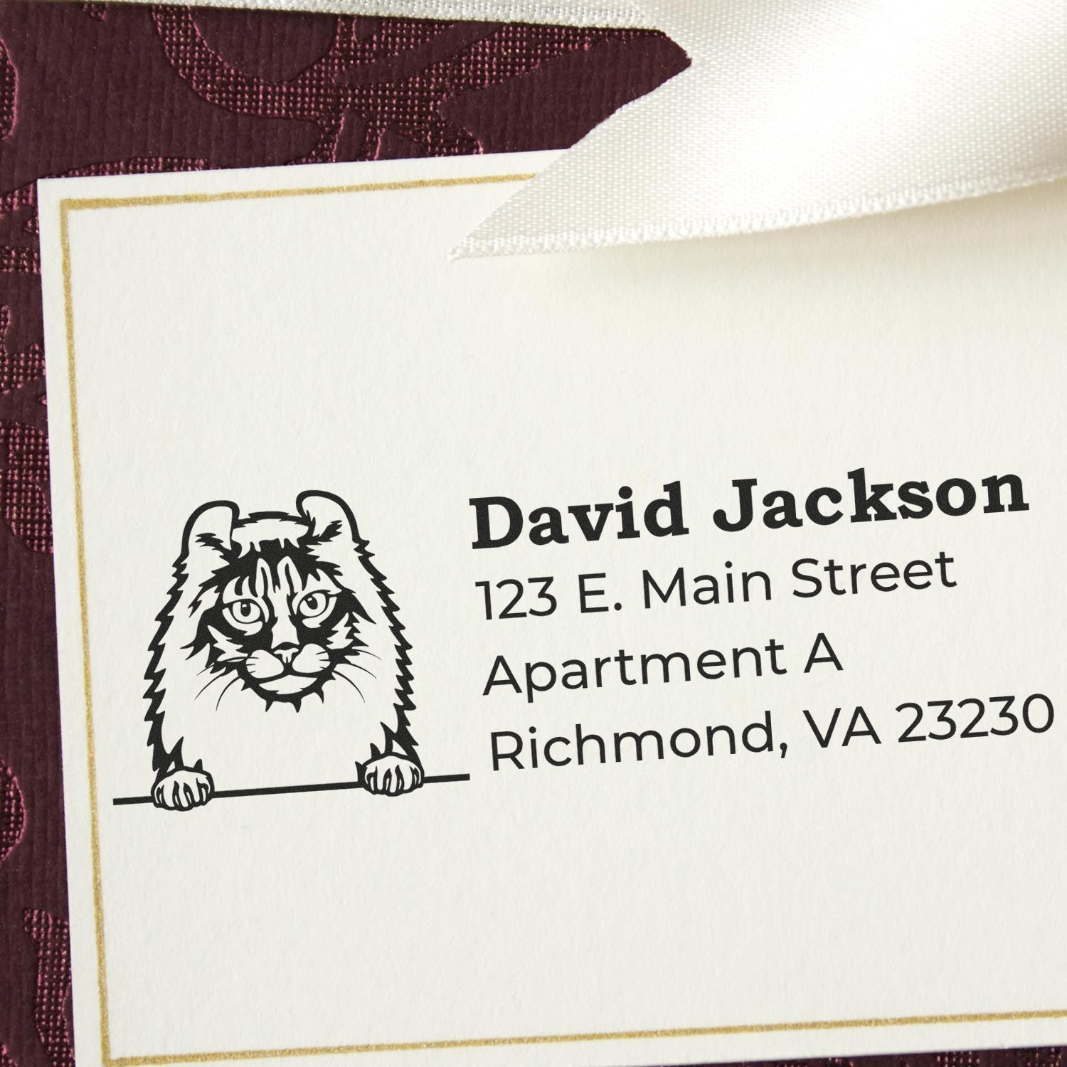 Wood Handle American Curl Cat Address Stamp on an envelope, featuring a cute cat illustration above the address text. The stamp adds a personal touch to the elegant, textured background.