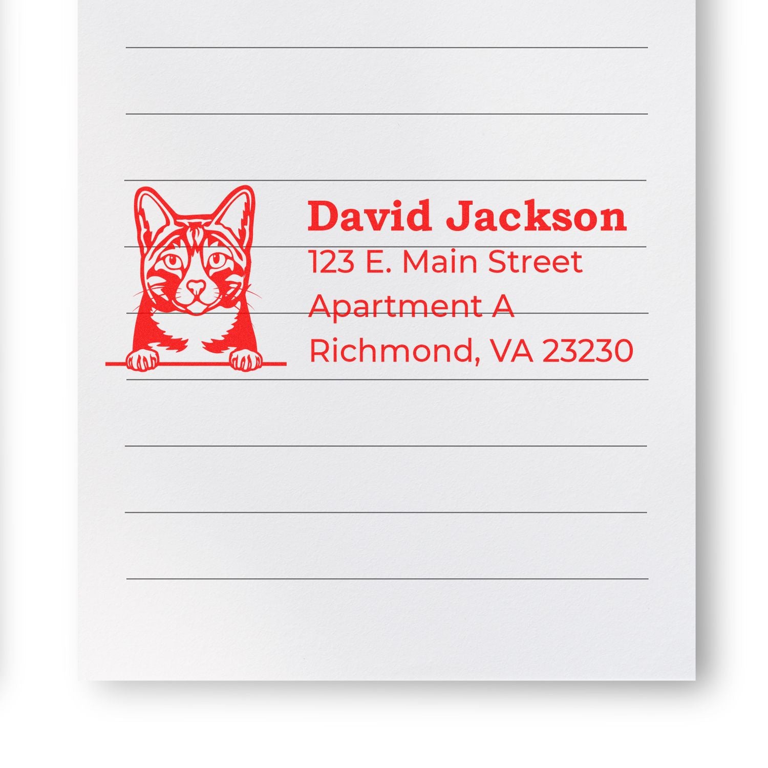 Self-Inking Arabian Mau Custom Address Stamp featuring a red cat design and sample address on lined paper. Perfect for personalizing mail with a unique feline touch.