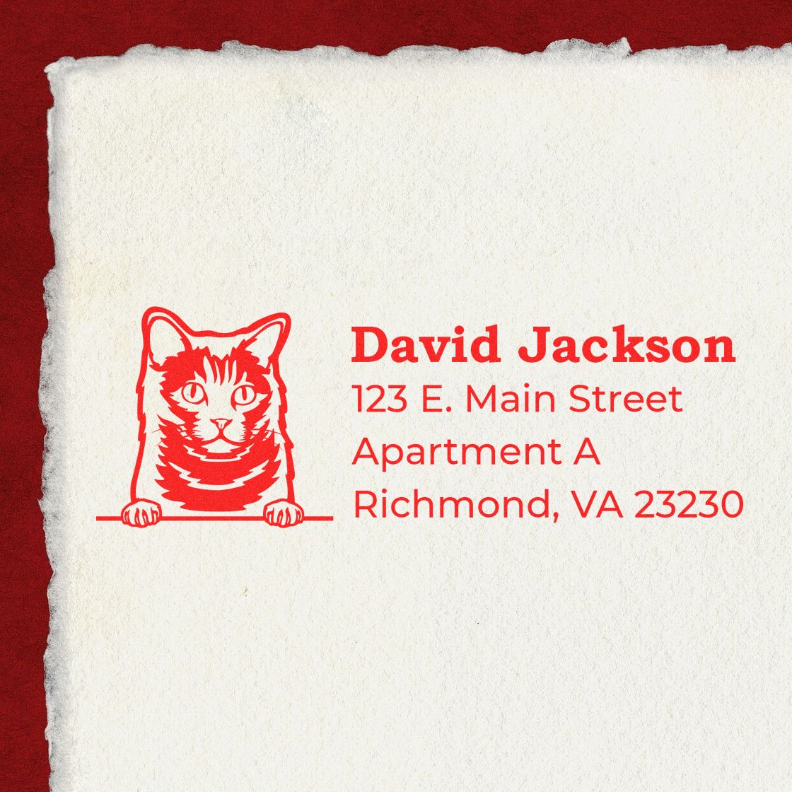 Self-Inking Chartreux Custom Address Stamp featuring a red cat design and personalized address on textured paper. Perfect for adding a unique touch to your mail.