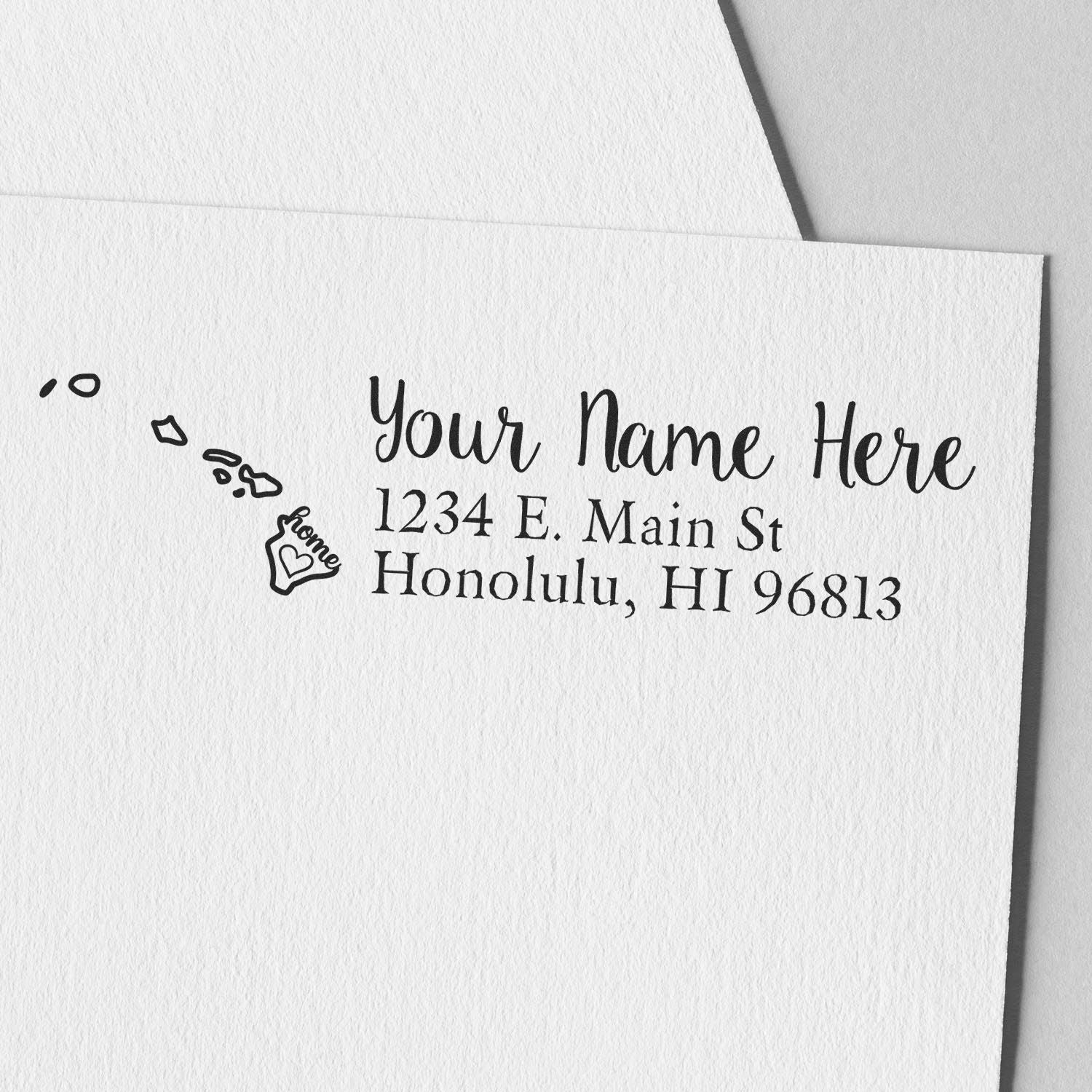 Slim Pre-Inked Hawaii State Love Custom Address Stamp on white paper, featuring a heart design with love and sample address: 1234 E. Main St, Honolulu, HI 96813.