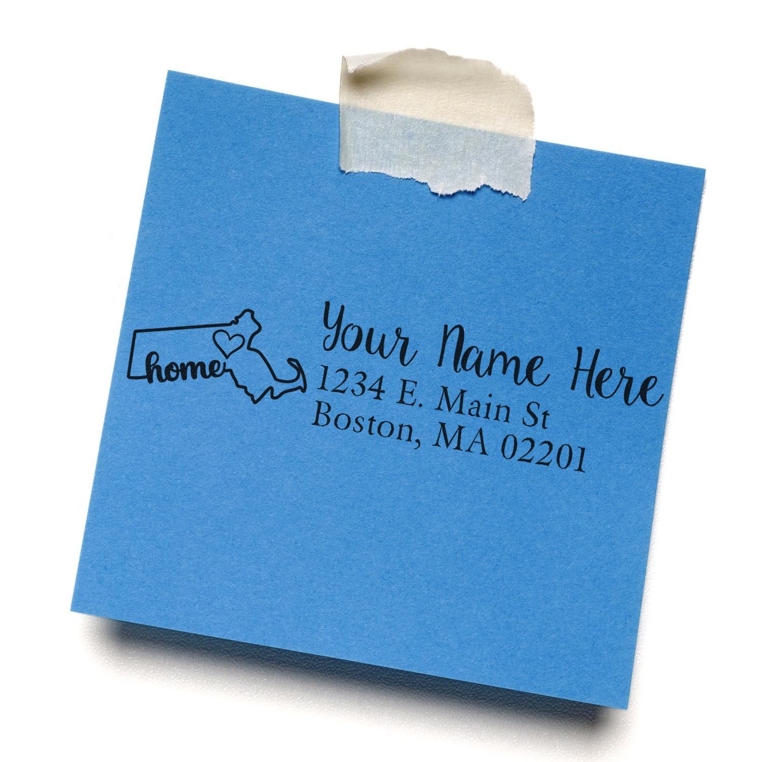 Blue sticky note with Your Name Here and an address stamped using the Massachusetts Self-Inking State Love Address Stamp, featuring a heart and state outline design.