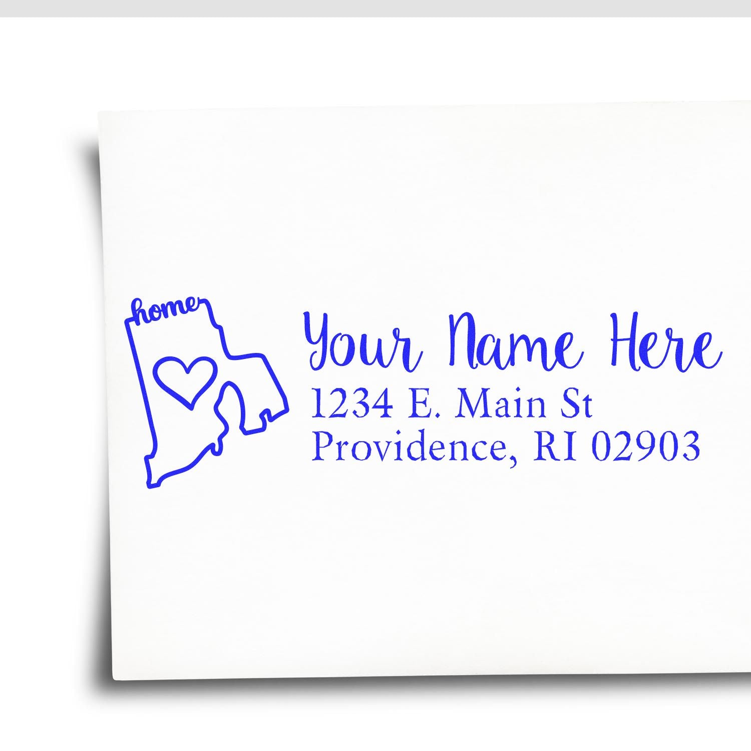 Wood Handle Rhode Island Custom Address Rubber Stamp on white paper, featuring a blue outline of Rhode Island with a heart and sample address text in elegant font.