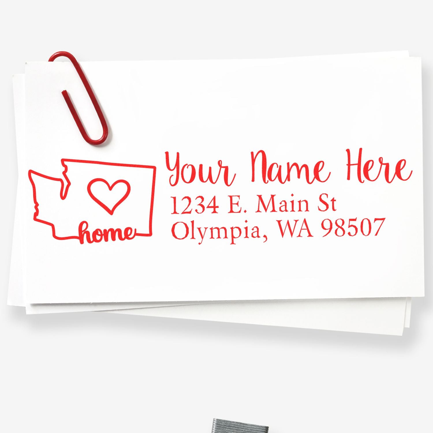 Washington Self-Inking State Love Address Stamp on white paper with red ink, featuring a heart inside the state outline and sample address text.