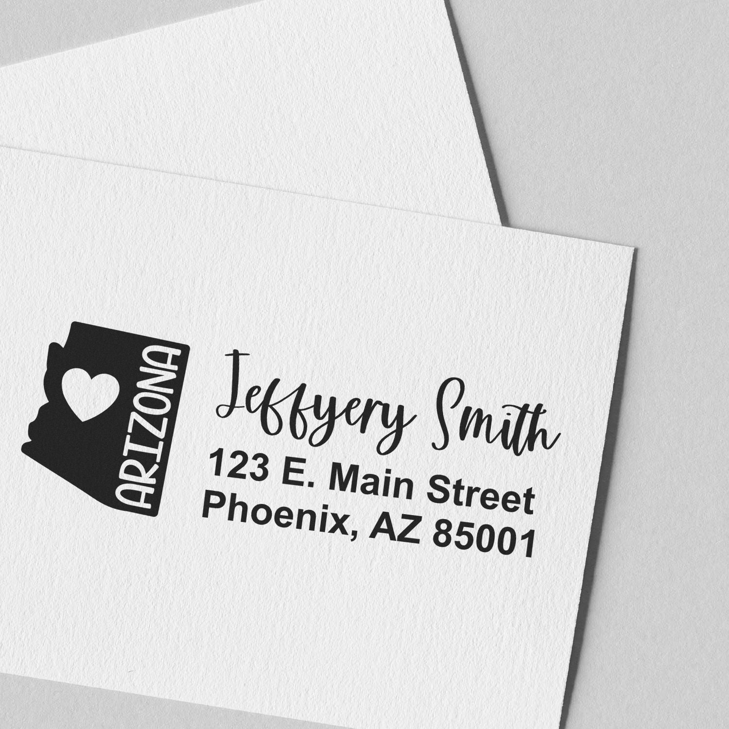 Arizona State Love Personalized Address Stamp on white paper, featuring a heart and Arizona design, with sample text: Jeffery Smith, 123 E. Main Street, Phoenix, AZ 85001.