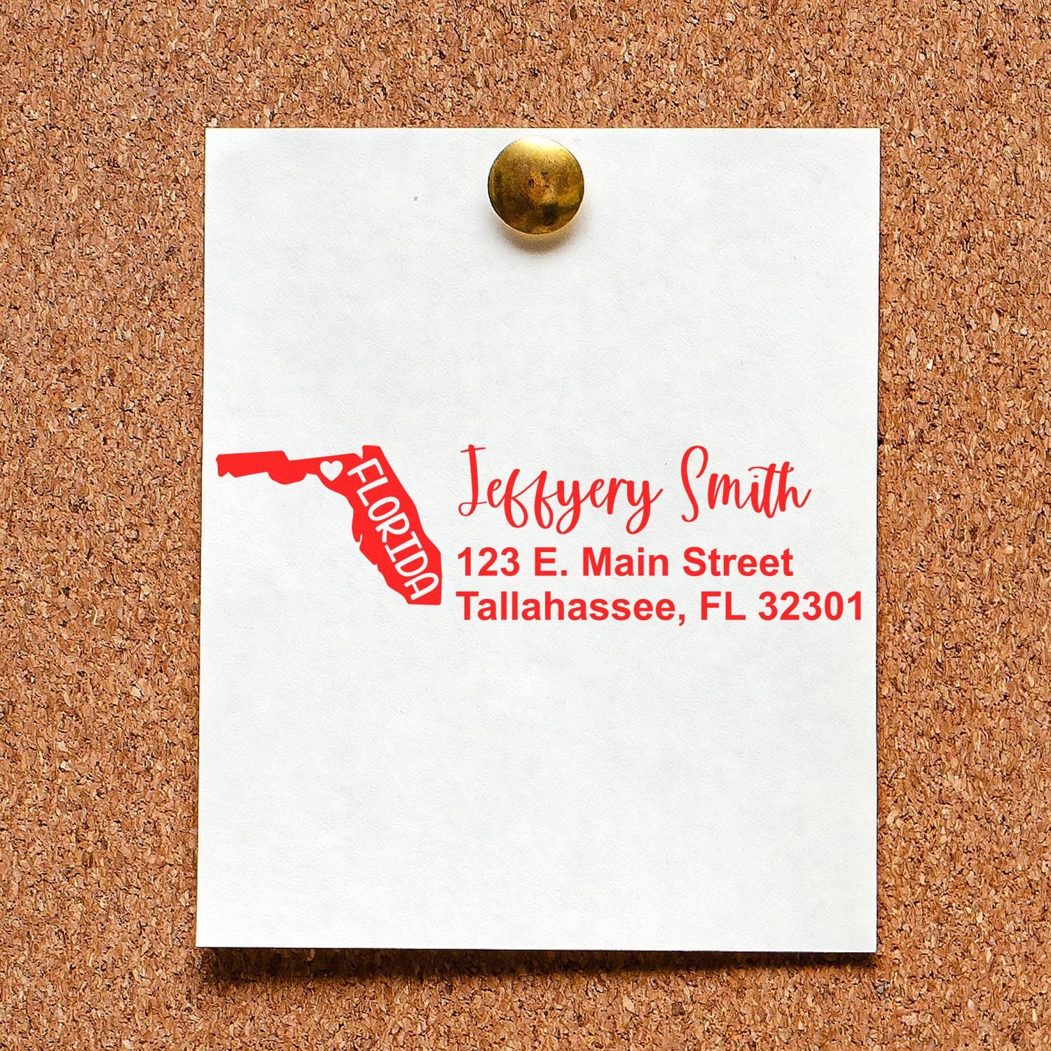 PSI Pre-Inked Florida State Love Customized Address Stamp on a corkboard, displaying a red Florida map and personalized address in elegant script.