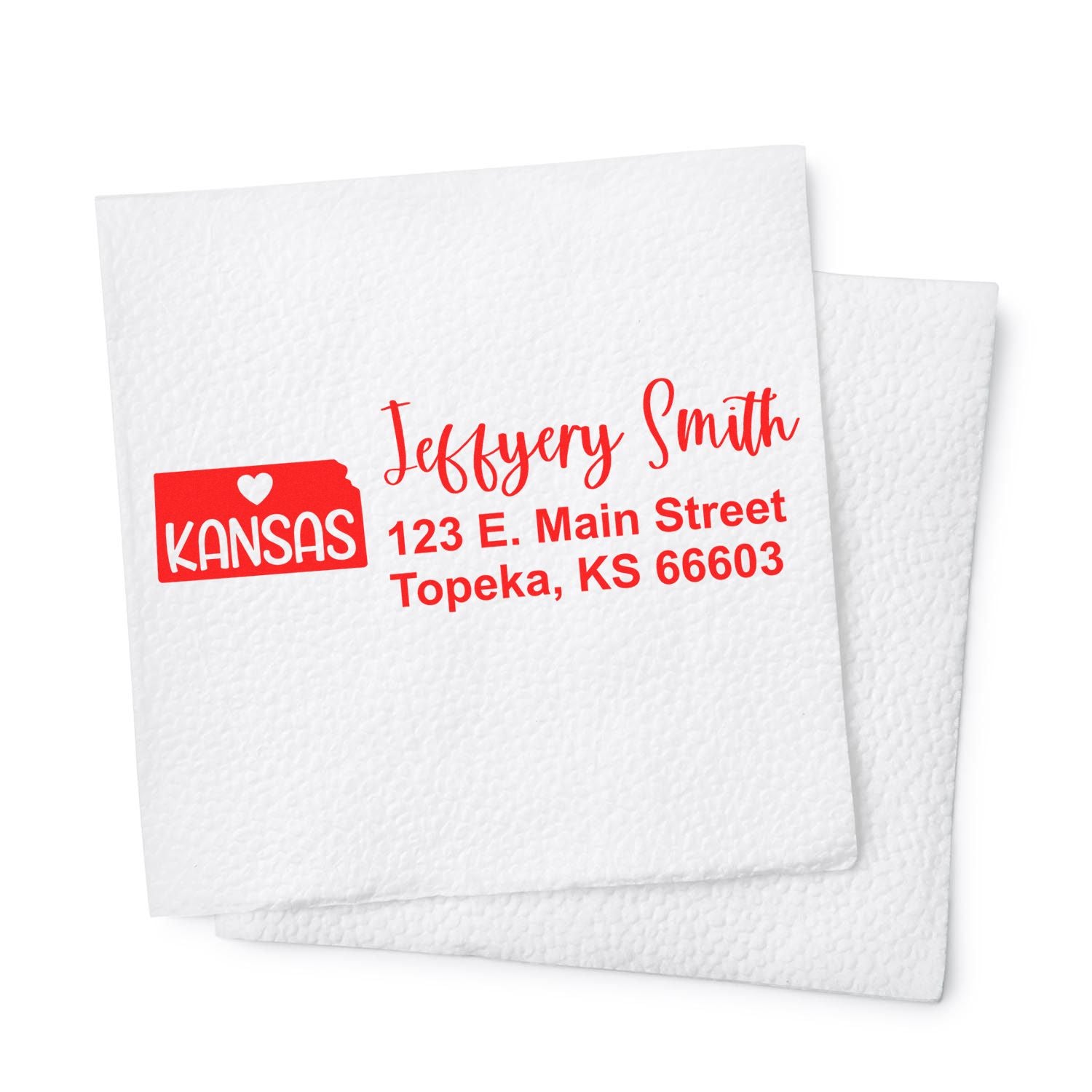 State Love of Kansas Custom Address Stamp Self-Inking displayed on a white napkin, featuring a red Kansas state outline with personalized address details in bold red text.