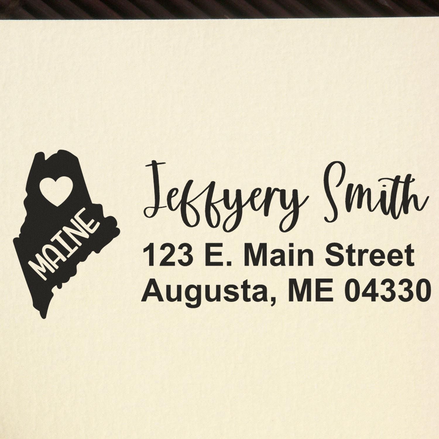 Maine State Love Personalized Address Stamp featuring a heart and state outline, with the name Jeffery Smith and address 123 E. Main Street, Augusta, ME 04330 in elegant script.