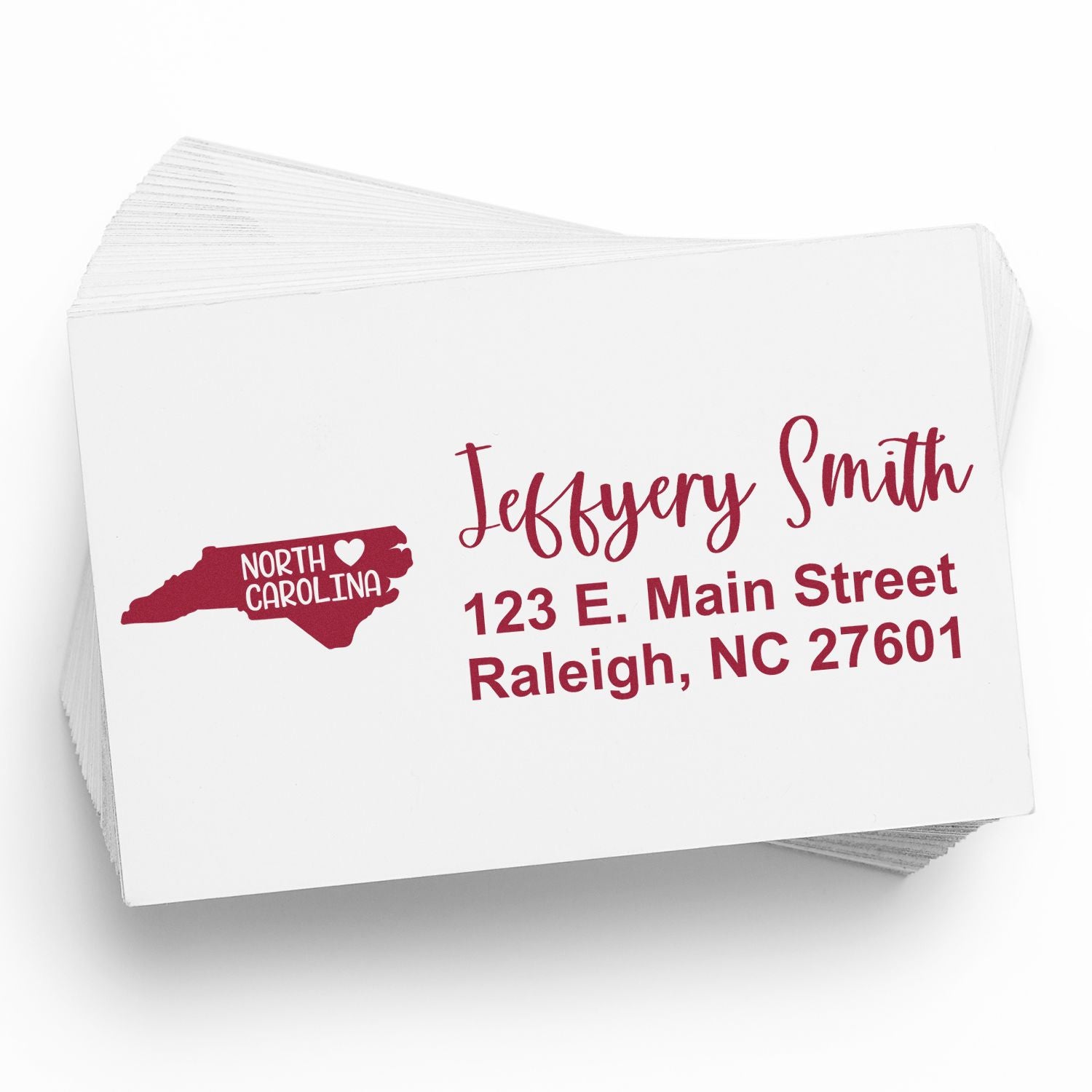 Stack of envelopes stamped with the PSI Pre-Inked North Carolina State Love Customized Address Stamp, featuring a red North Carolina map and personalized address in elegant script.