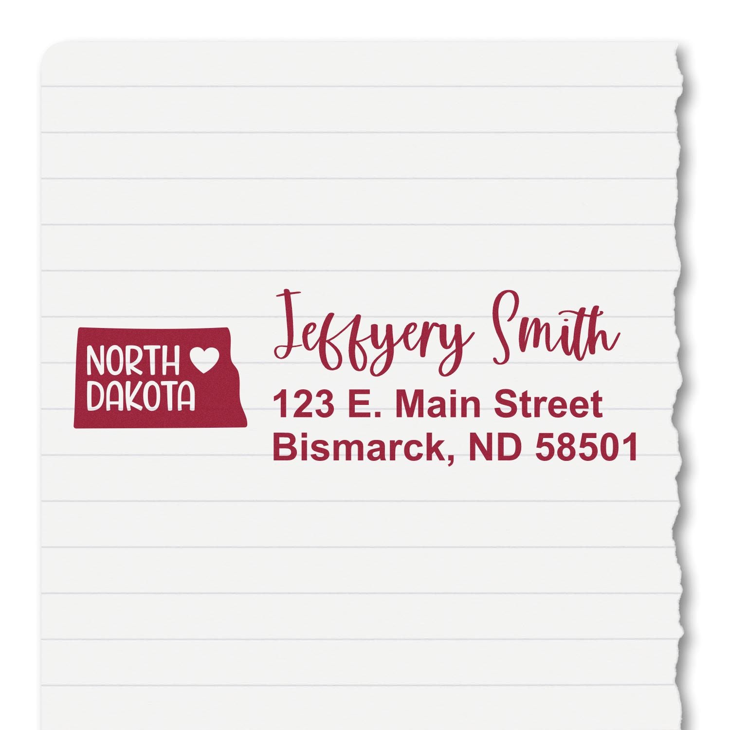 State Love of North Dakota Custom Address Stamp Self-Inking on lined paper, featuring a red North Dakota state outline with heart, personalized with name and address in elegant font.