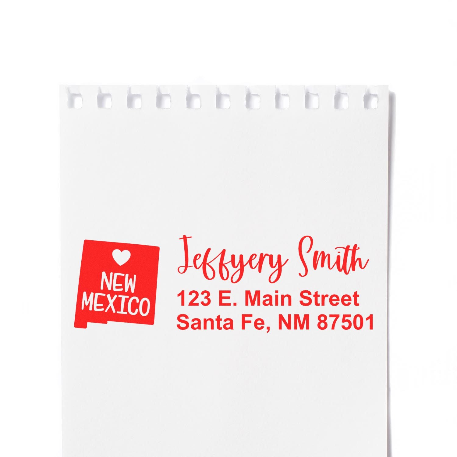 New Mexico State Love Personalized Address Stamp in red ink on white paper, featuring a heart and state outline with sample address: Jeffery Smith, 123 E. Main Street, Santa Fe, NM 87501.