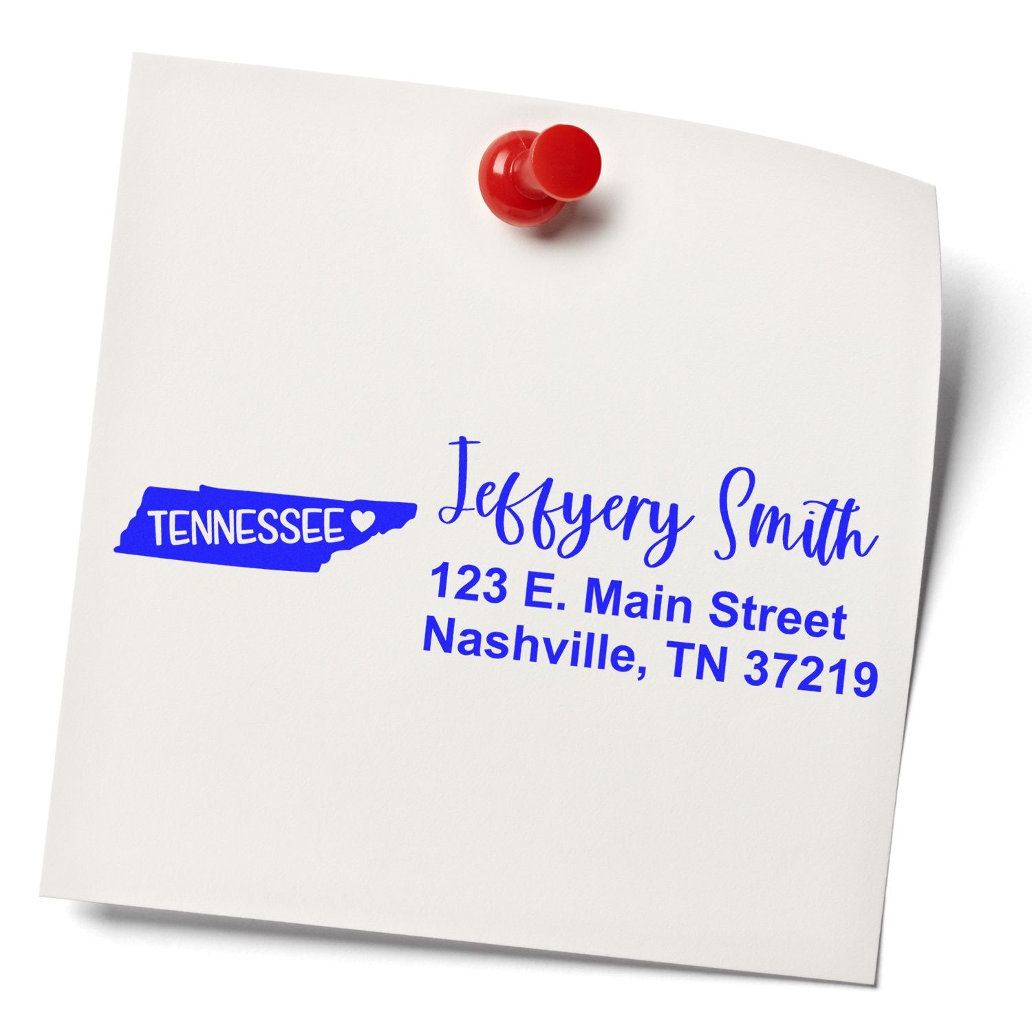 PSI Pre-Inked Tennessee State Love Customized Address Stamp on a white note with a red pushpin, displaying a sample address in blue ink with a Tennessee state outline and heart.