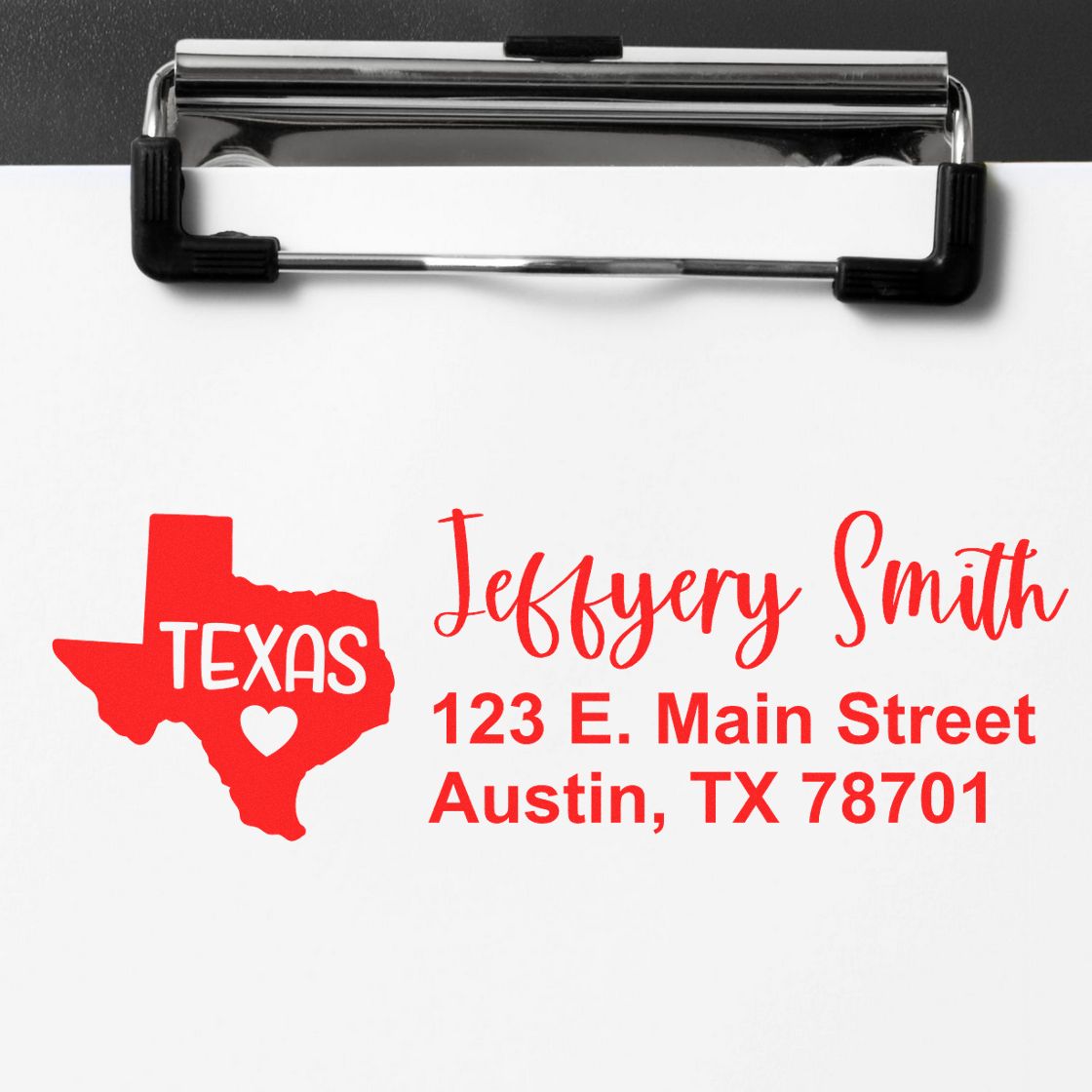 Texas State Love Personalized Address Stamp in red ink on white paper, featuring a Texas map with a heart and custom address details for Jeffery Smith, 123 E. Main Street, Austin, TX 78701.