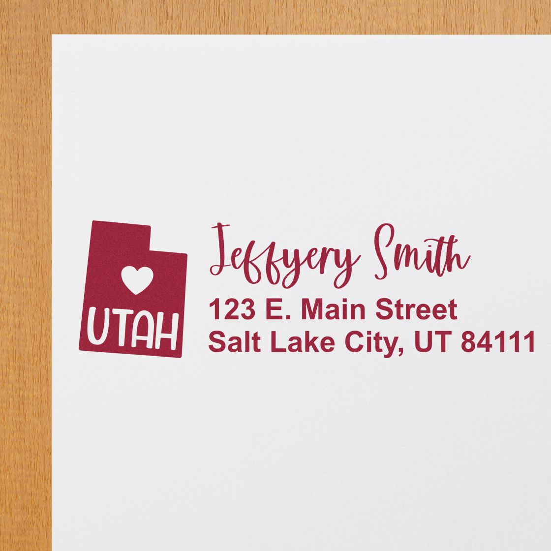 Utah State Love Personalized Address Stamp on white paper, featuring a red Utah state outline with a heart and custom address in elegant script. Perfect for adding a personal touch to mail.