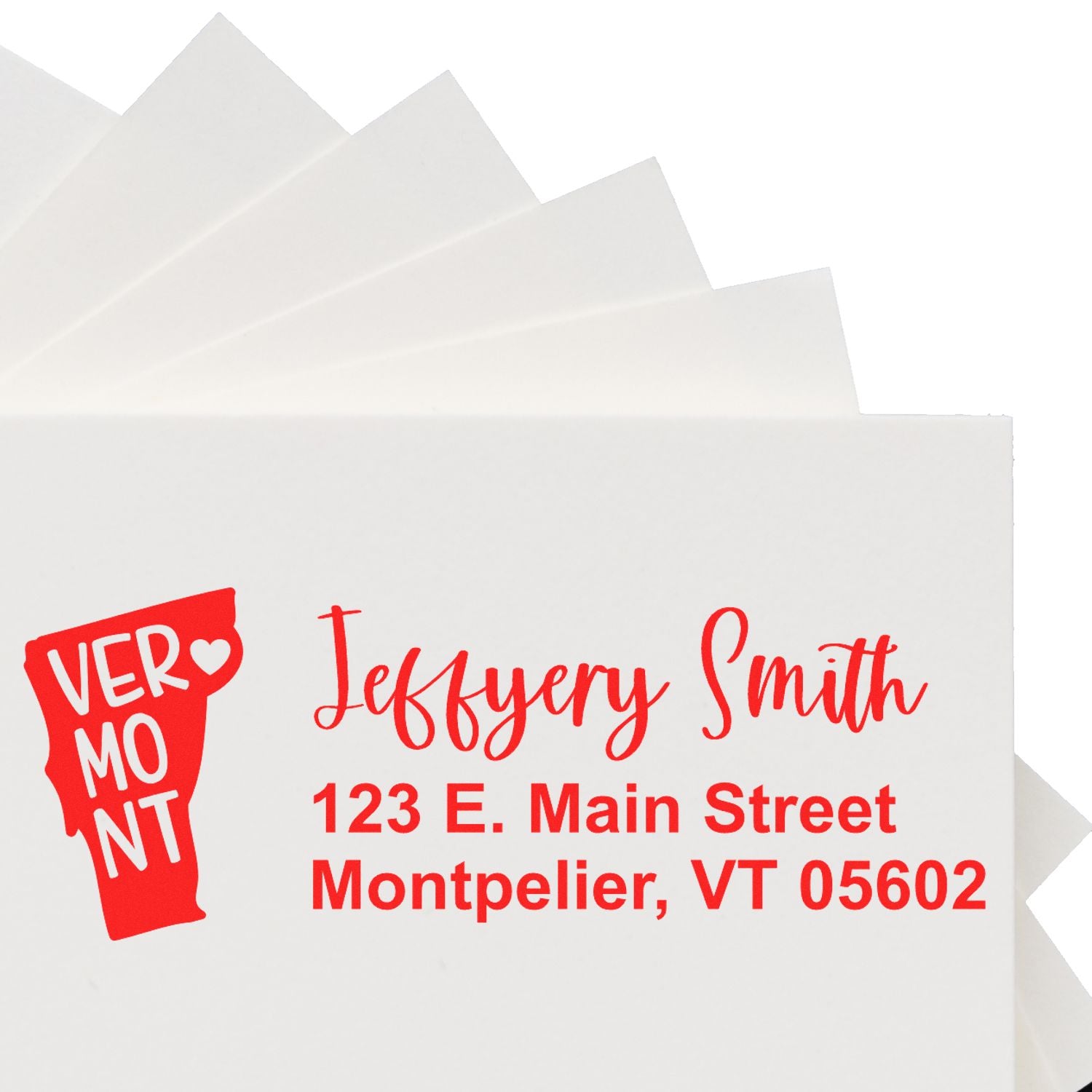 PSI Pre-Inked Vermont State Love Customized Address Stamp on white envelopes, featuring a red Vermont state outline and personalized address in red text.