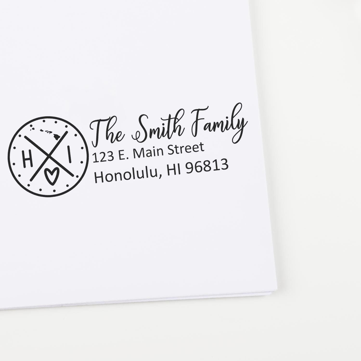 Hawaii State Pride Customized Address Stamp on white paper, featuring a circular design with HI and a heart, alongside personalized address details for The Smith Family in elegant script.