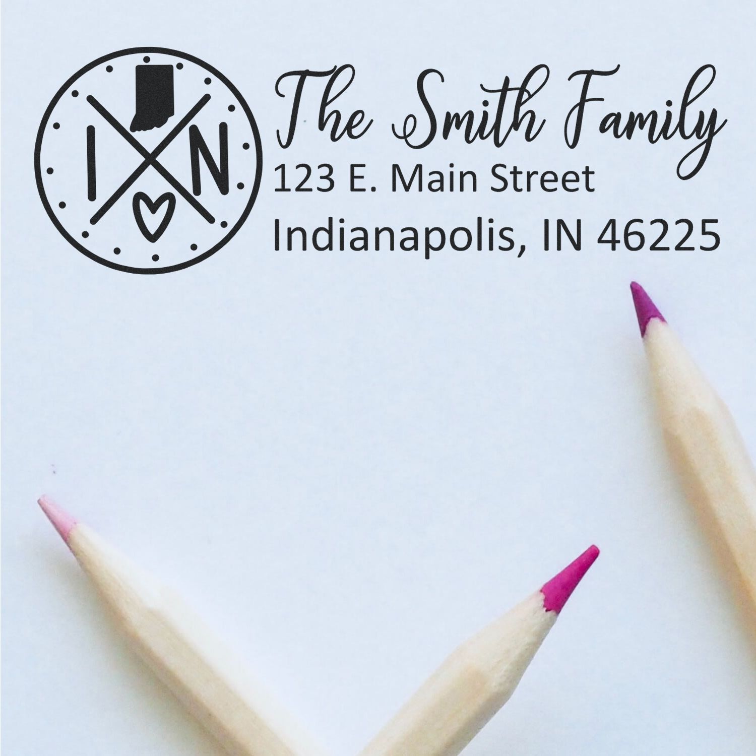 Indiana State Pride Customized Address Stamp featuring 'The Smith Family' with an Indiana map design, shown on white paper with two pink-tipped pencils.