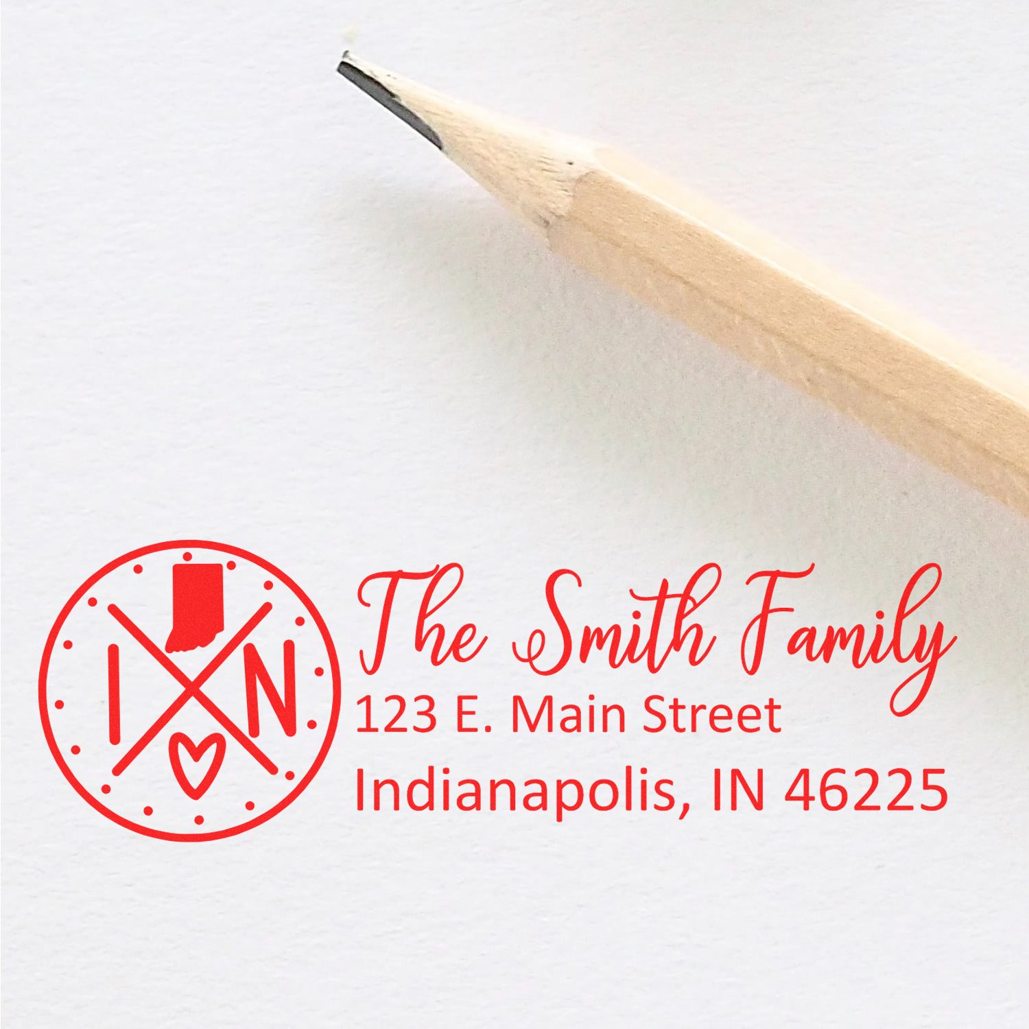 Indiana State Pride Customized Address Stamp featuring a red Indiana map and heart design, personalized with The Smith Family and address in red ink on white paper, next to a pencil.