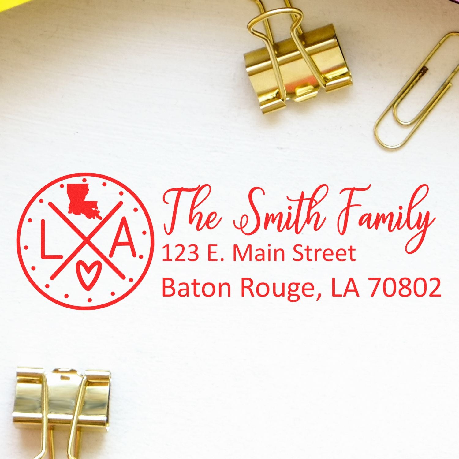 Louisiana State Pride Customized Address Stamp featuring The Smith Family with an LA design, shown on a white surface with gold binder clips and paperclips.