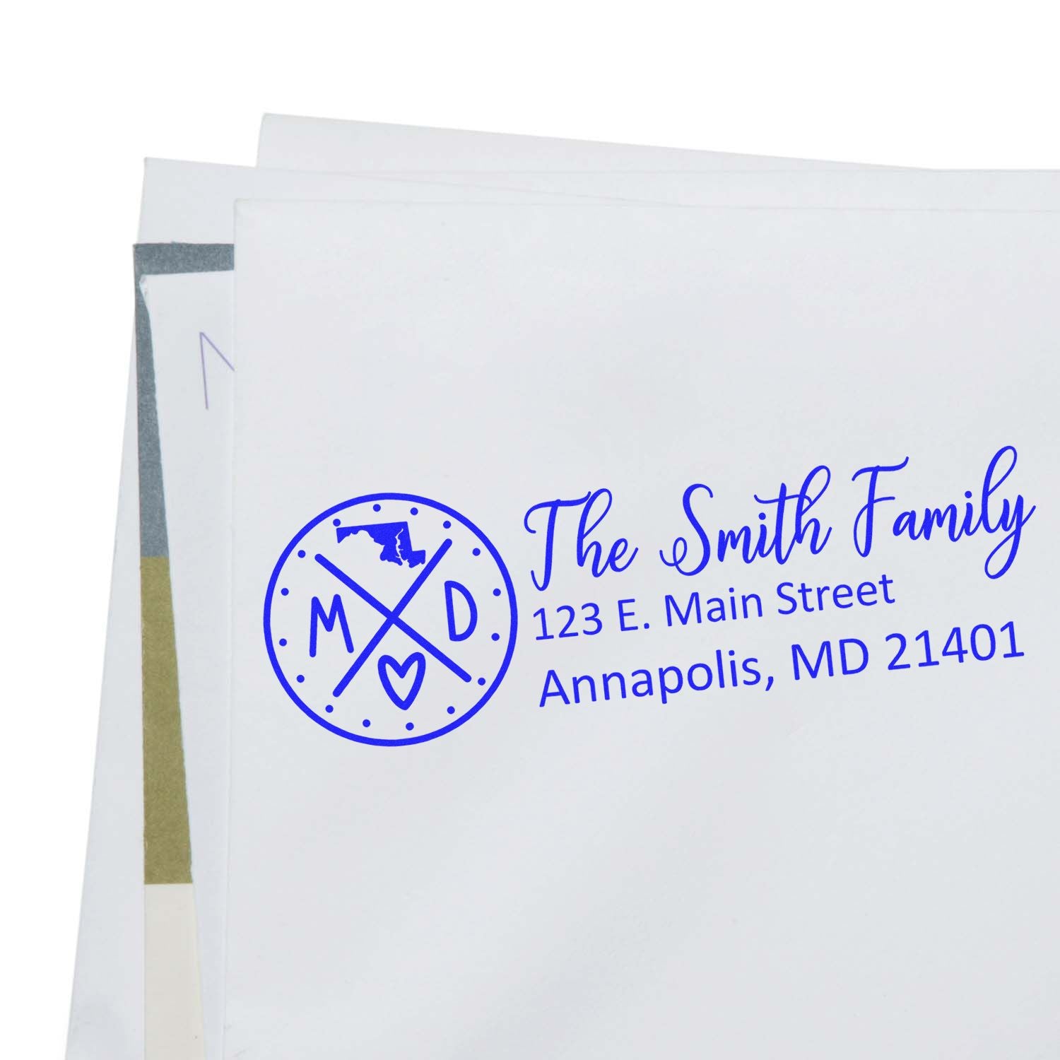 Envelope with a blue Maryland State Pride Customized Address Stamp featuring The Smith Family and an address in Annapolis, MD. The stamp includes a Maryland map and heart design.