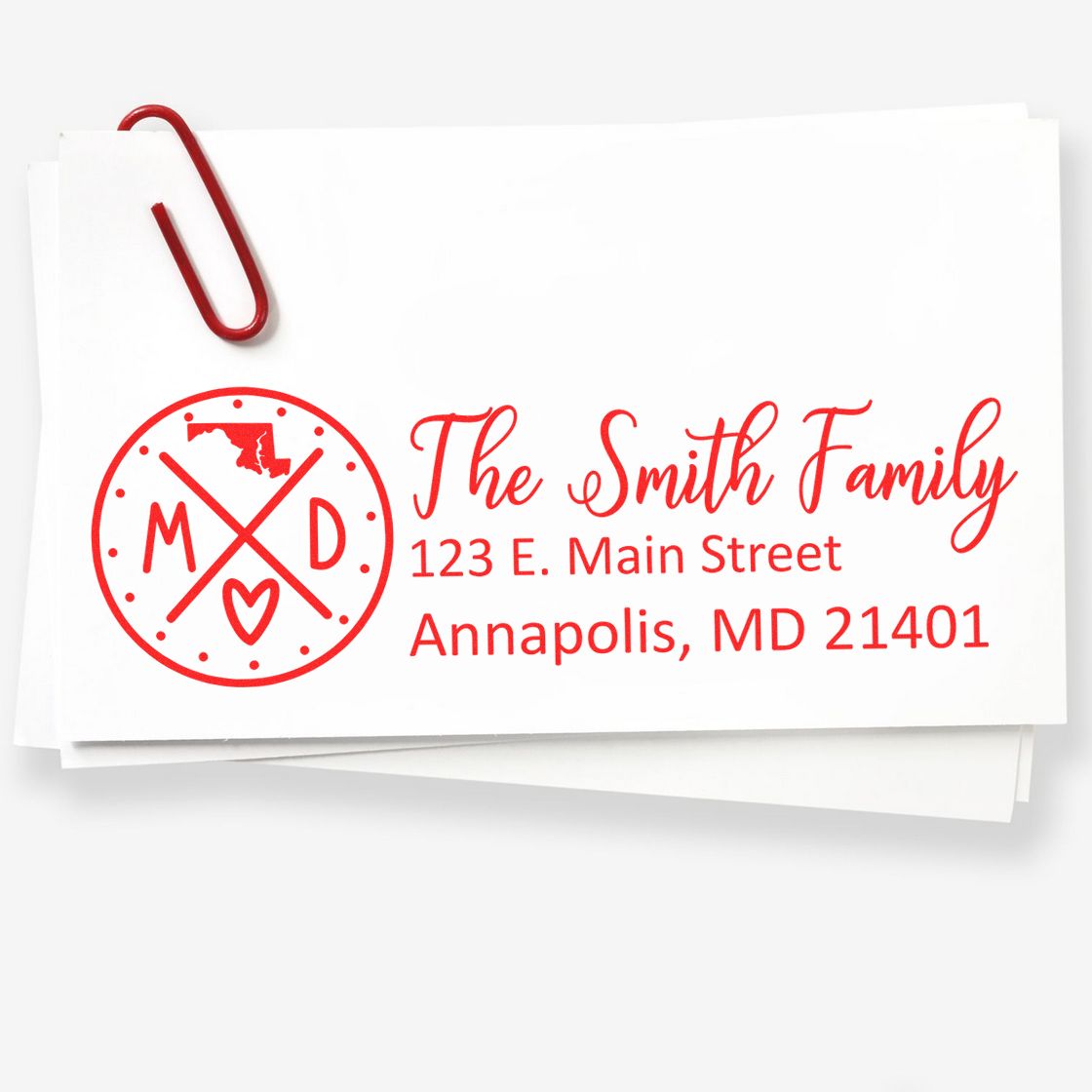 PSI Pre-Inked Maryland State Pride Customized Address Stamp in red ink on white paper, featuring a Maryland map and heart design, with The Smith Family and an Annapolis address.