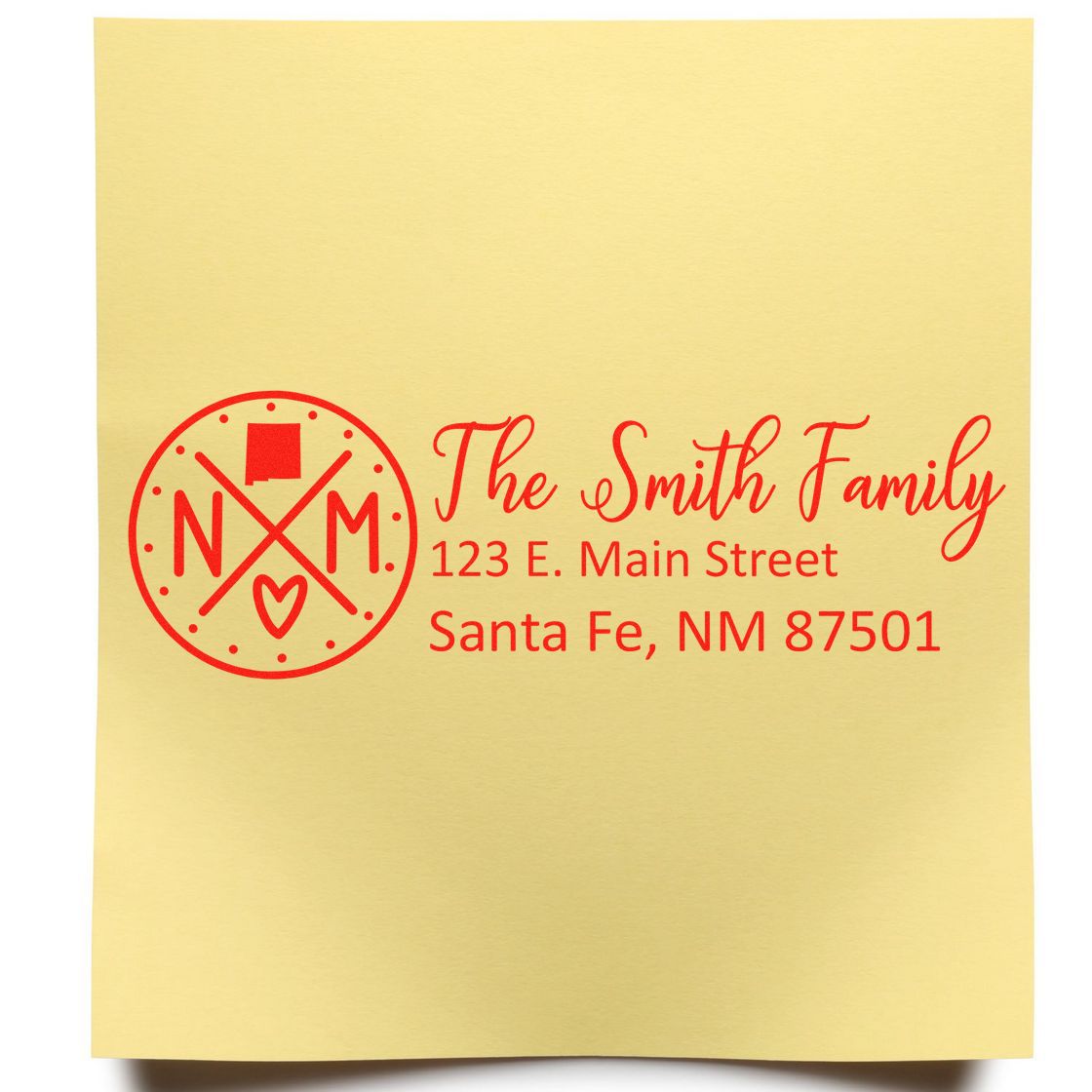 PSI Pre-Inked New Mexico State Pride Customized Address Stamp on yellow paper, featuring The Smith Family with a red NM logo, address, and heart design.