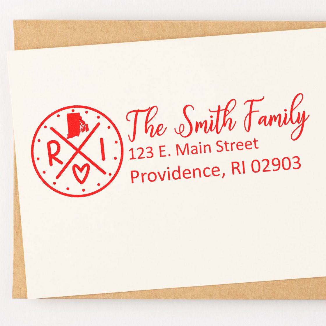 Rhode Island State Pride Customized Address Stamp in red ink on an envelope, featuring a circular design with RI and a heart, personalized with The Smith Family and address details.