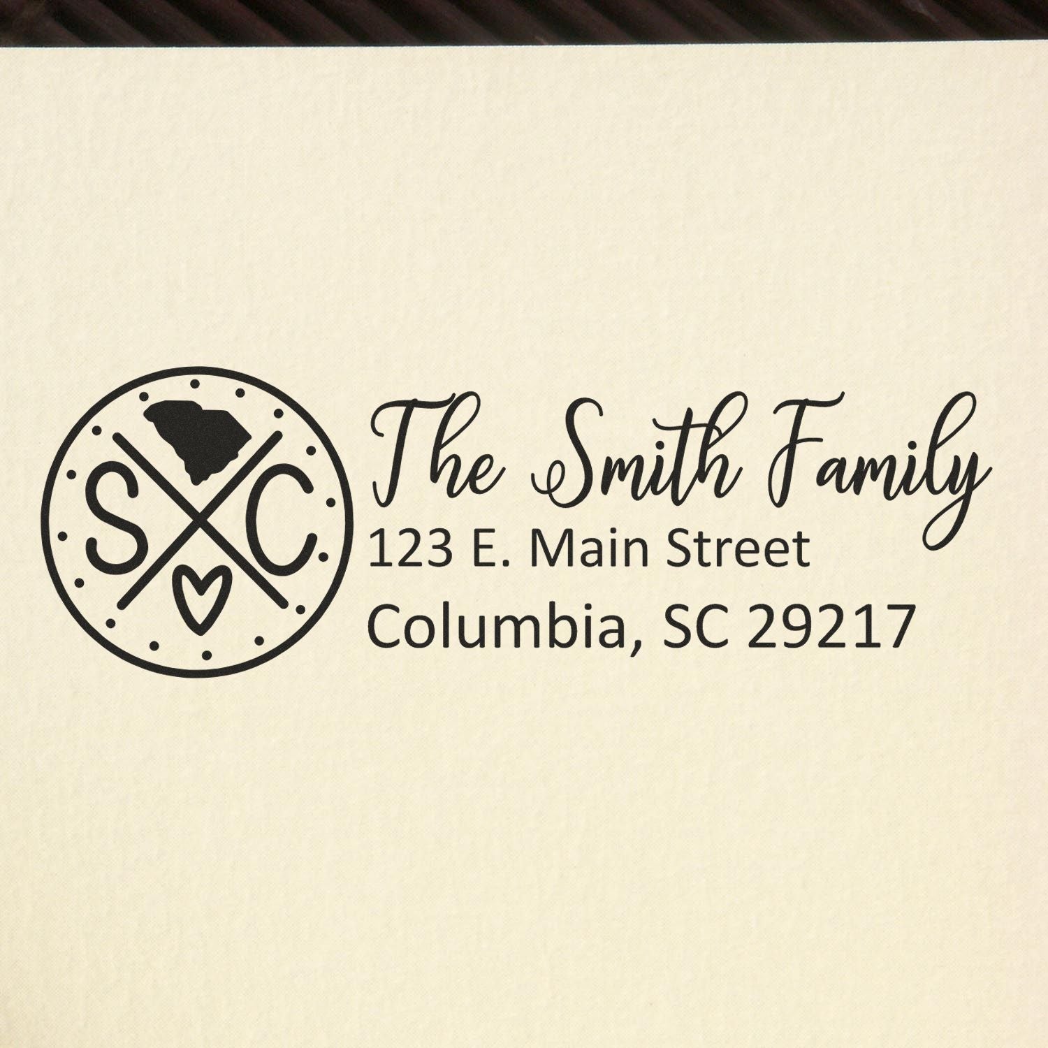 South Carolina State Pride Customized Address Stamp featuring a circular design with SC and a heart, personalized with The Smith Family, 123 E. Main Street, Columbia, SC 29217 in elegant script.