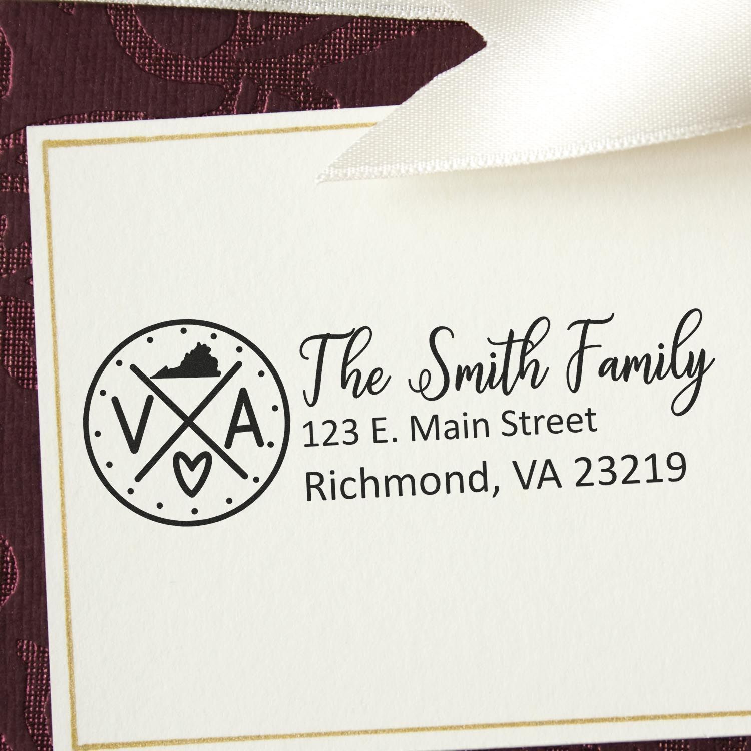 Virginia State Pride Customized Address Stamp on an envelope, featuring a circular VA design with a heart and state outline. Text reads The Smith Family, 123 E. Main Street, Richmond, VA 23219.