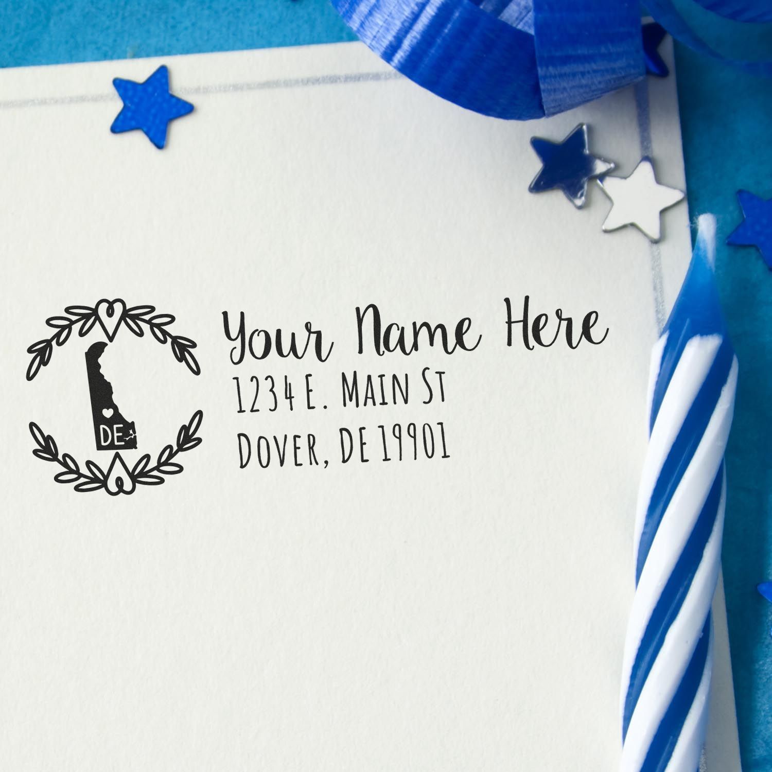 Delaware State Custom Return Address Stamp on an envelope with blue decorations and a striped candle, showcasing personalized text and a Delaware state outline design.